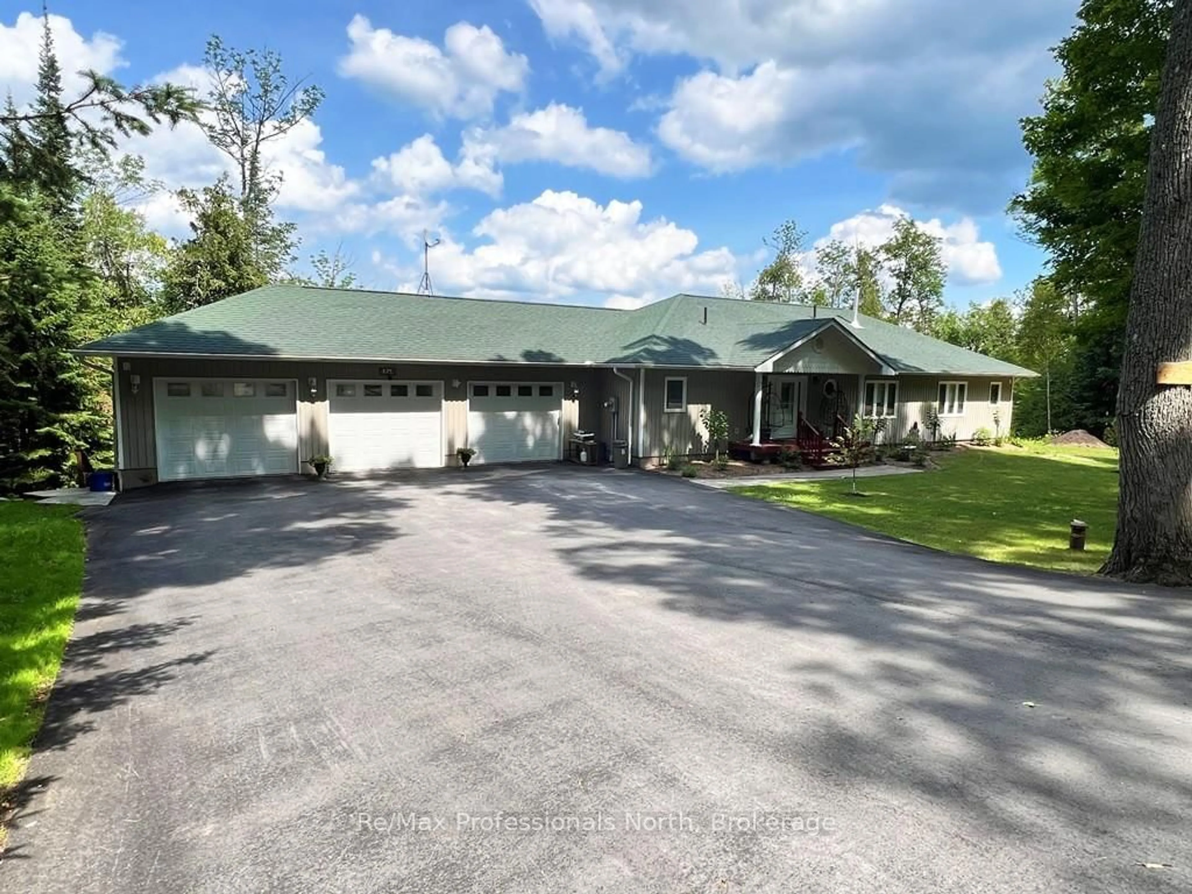 A pic from outside/outdoor area/front of a property/back of a property/a pic from drone, street for 1246 Grace River Rd, Dysart et al Ontario K0L 1M1
