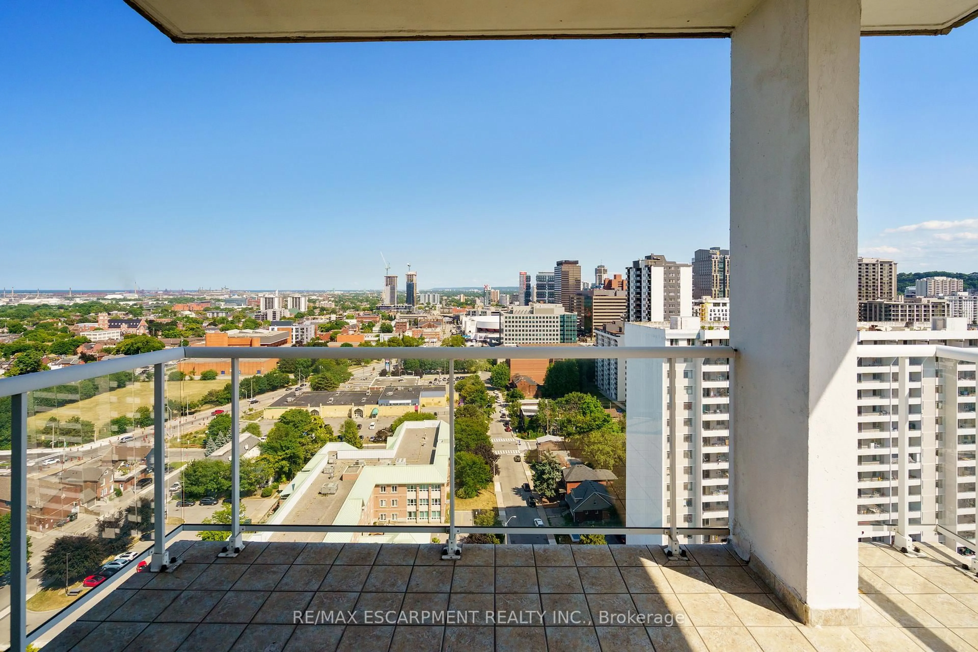 Balcony in the apartment, city buildings view from balcony for 75 Queen St #2203, Hamilton Ontario L8R 3J3