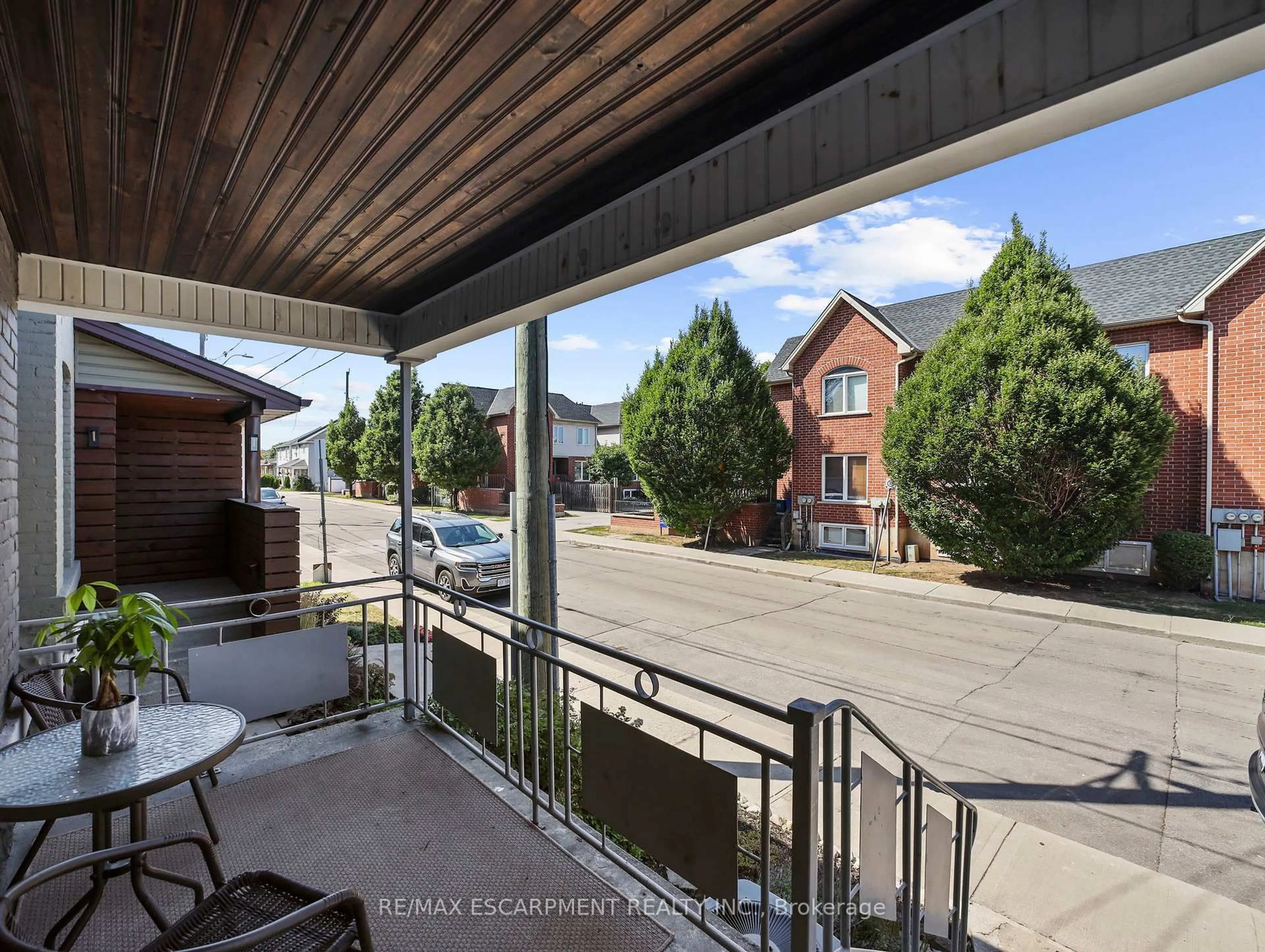 Patio, city buildings view from balcony for 114 BURTON St, Hamilton Ontario L8L 3R5
