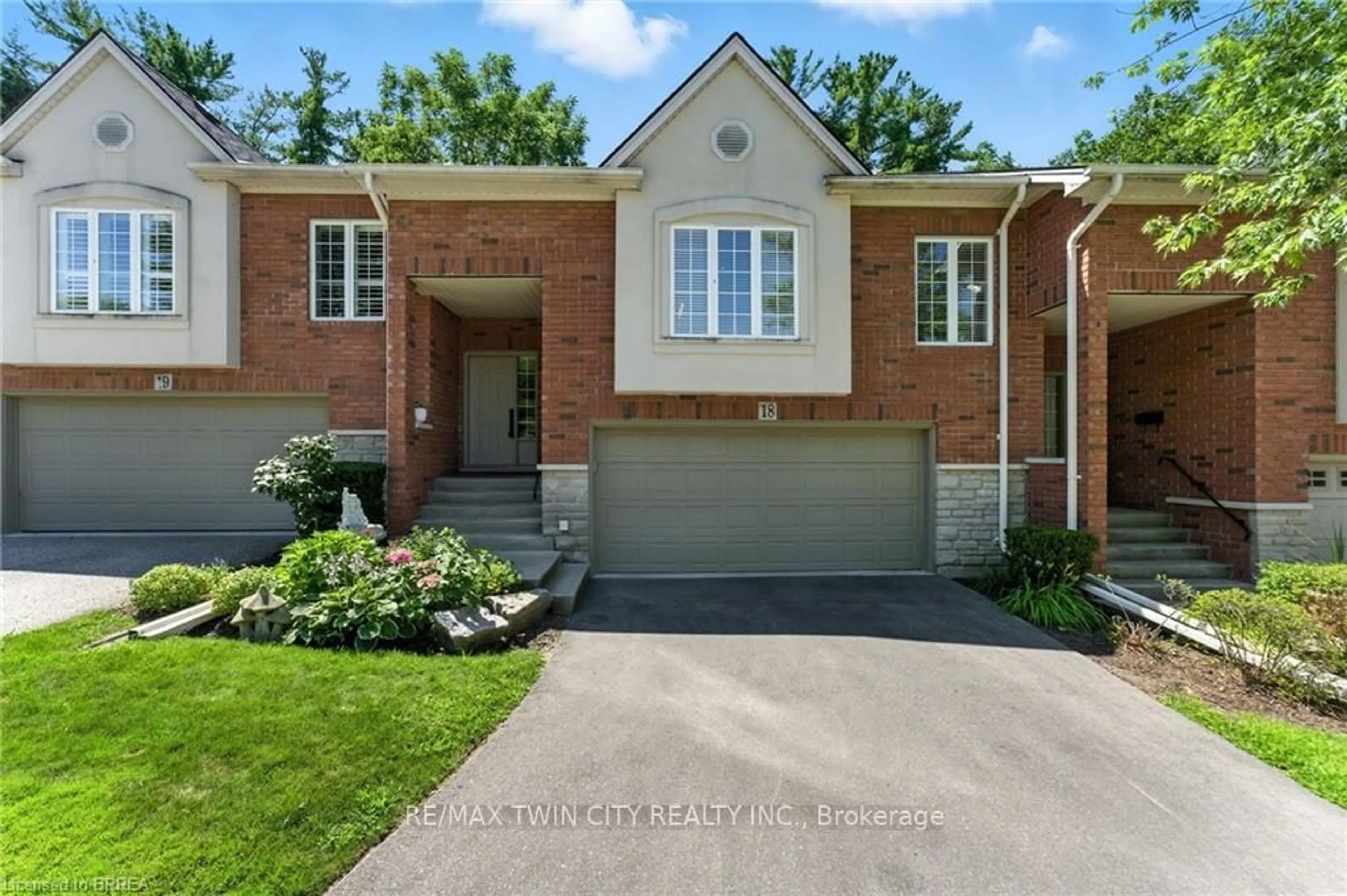 Home with brick exterior material, street for 24 Hardy Rd #18, Brantford Ontario N3T 5K6