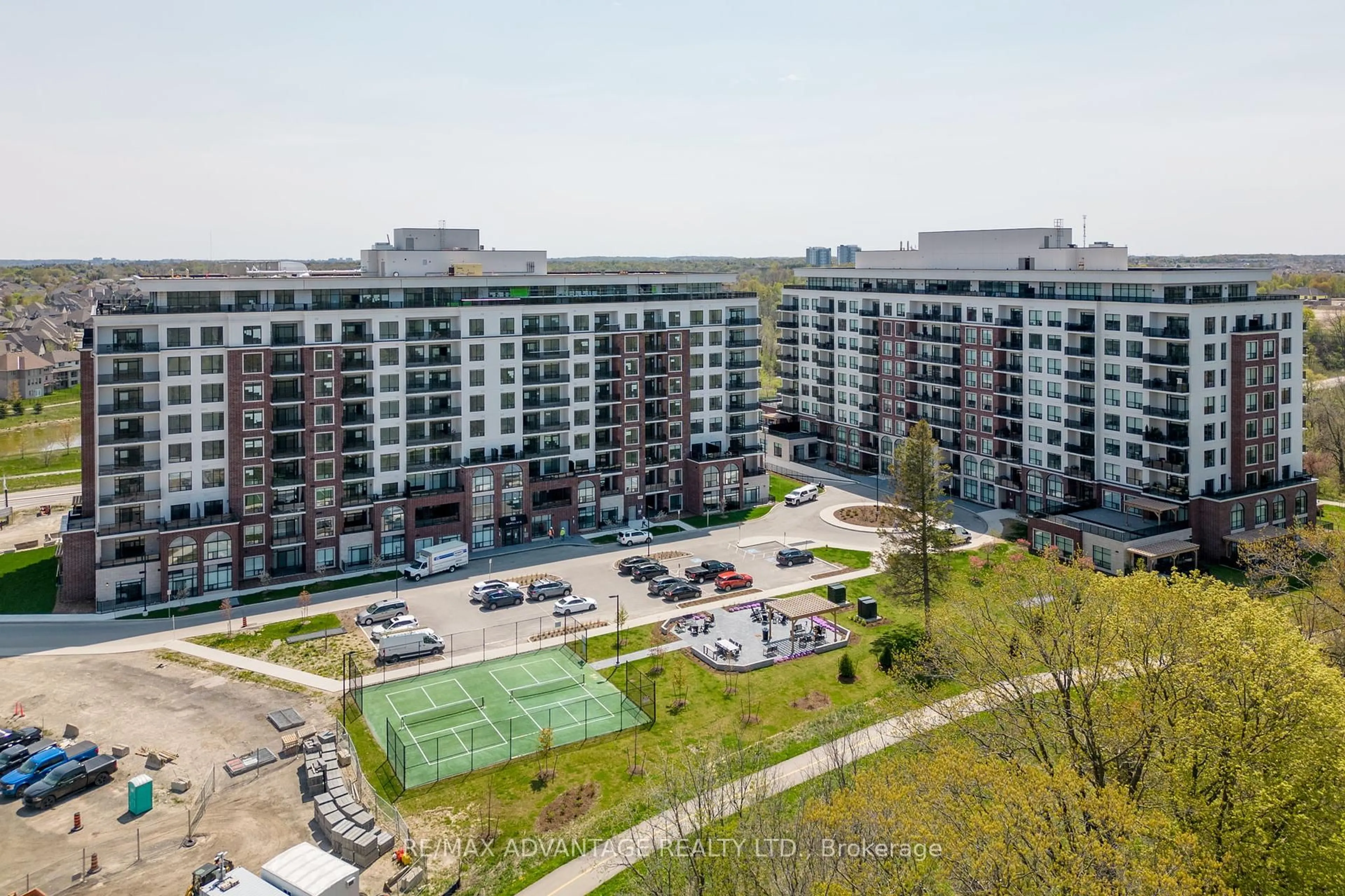 A pic from outside/outdoor area/front of a property/back of a property/a pic from drone, city buildings view from balcony for 480 Callaway Rd #102, London North Ontario N6G 0Z3