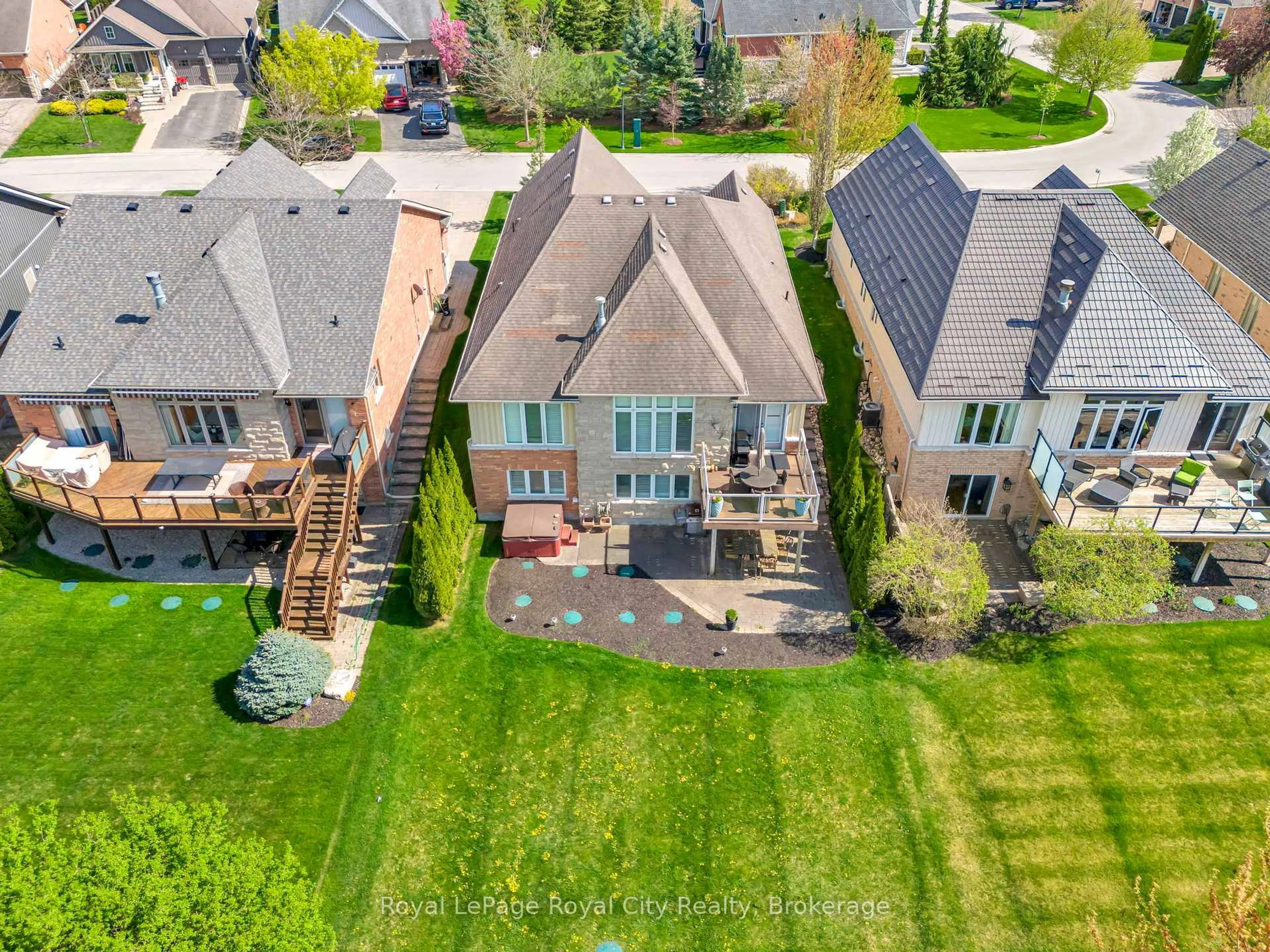 A pic from outside/outdoor area/front of a property/back of a property/a pic from drone, unknown for 74 Aberfoyle Mill Cres, Puslinch Ontario N0B 2J0