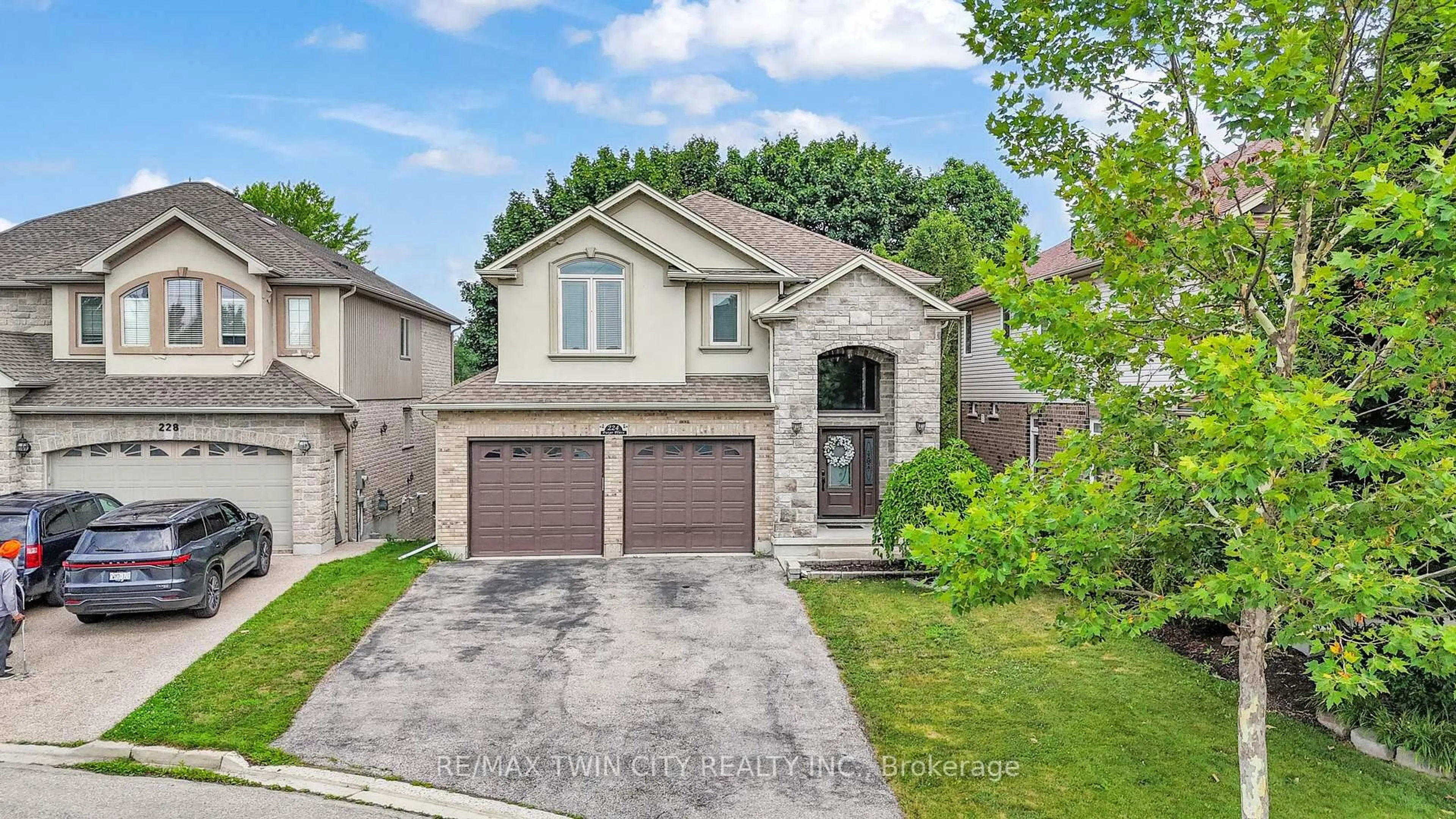 Home with brick exterior material, street for 224 Paige Pl, Kitchener Ontario N2K 4P5