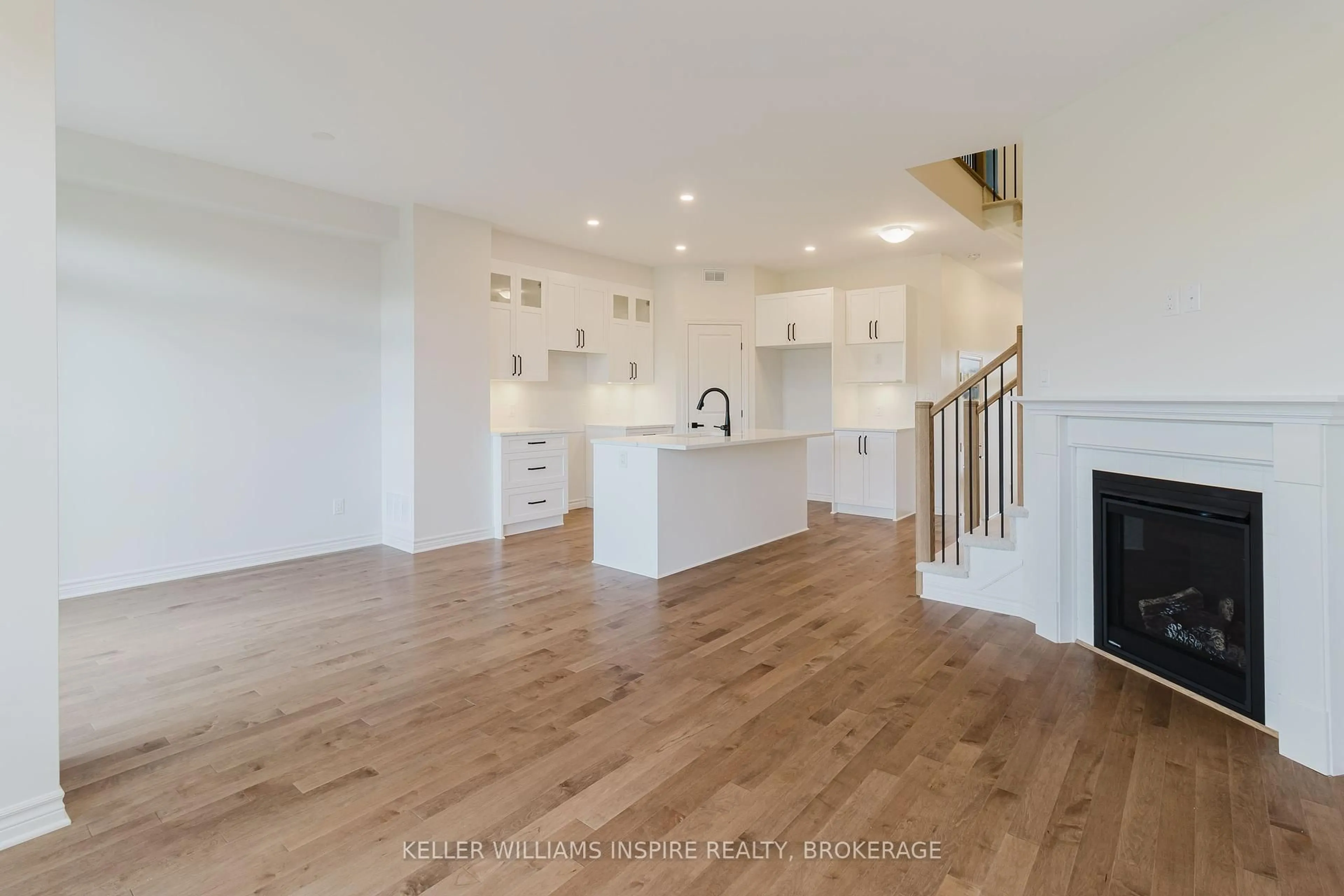 Open concept kitchen, wood/laminate floor for 444 Buckthorn Dr, Kingston Ontario K7P 0V6