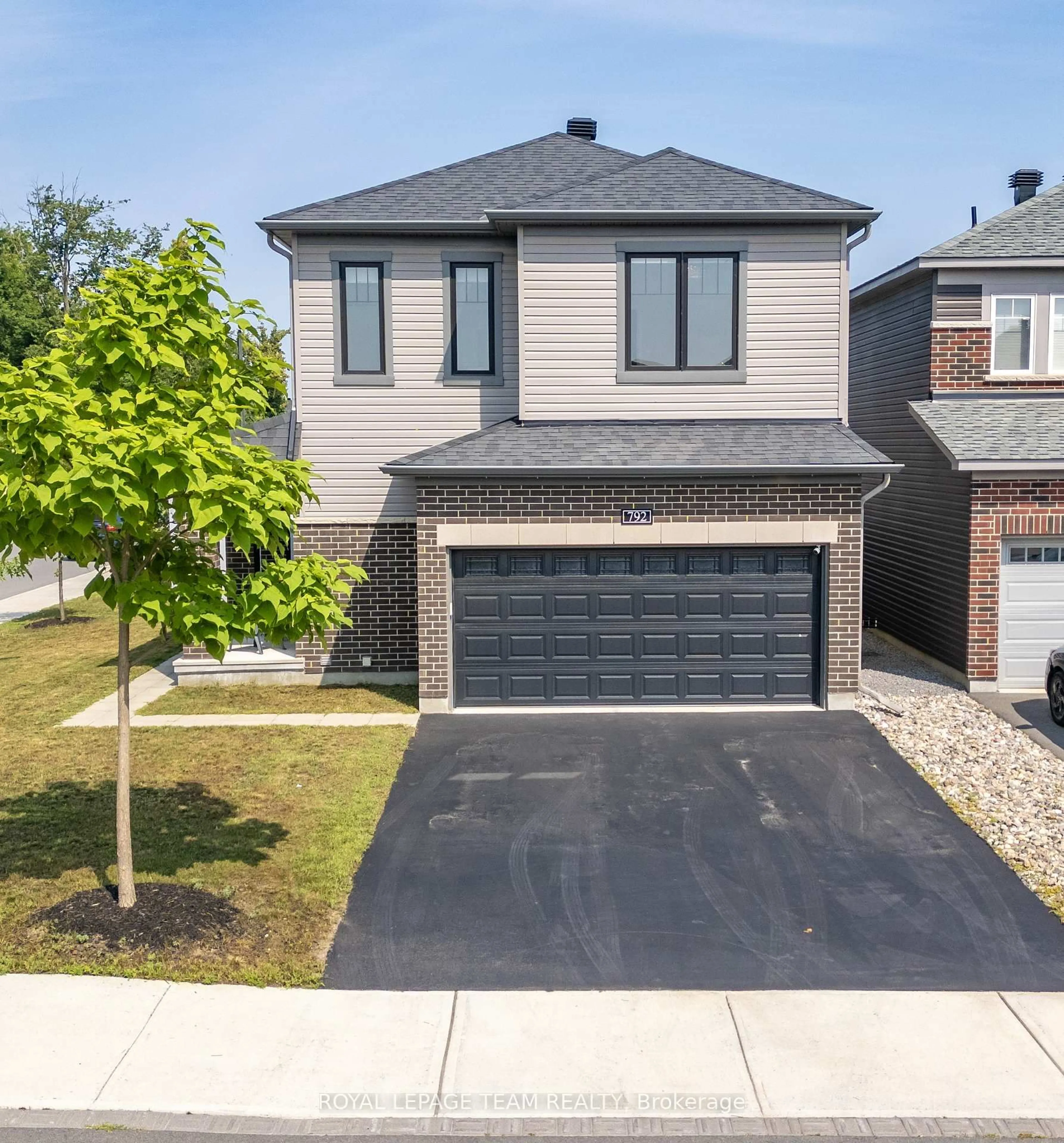 Home with brick exterior material, street for 792 Cappamore Dr, Ottawa Ontario K2J 6V6