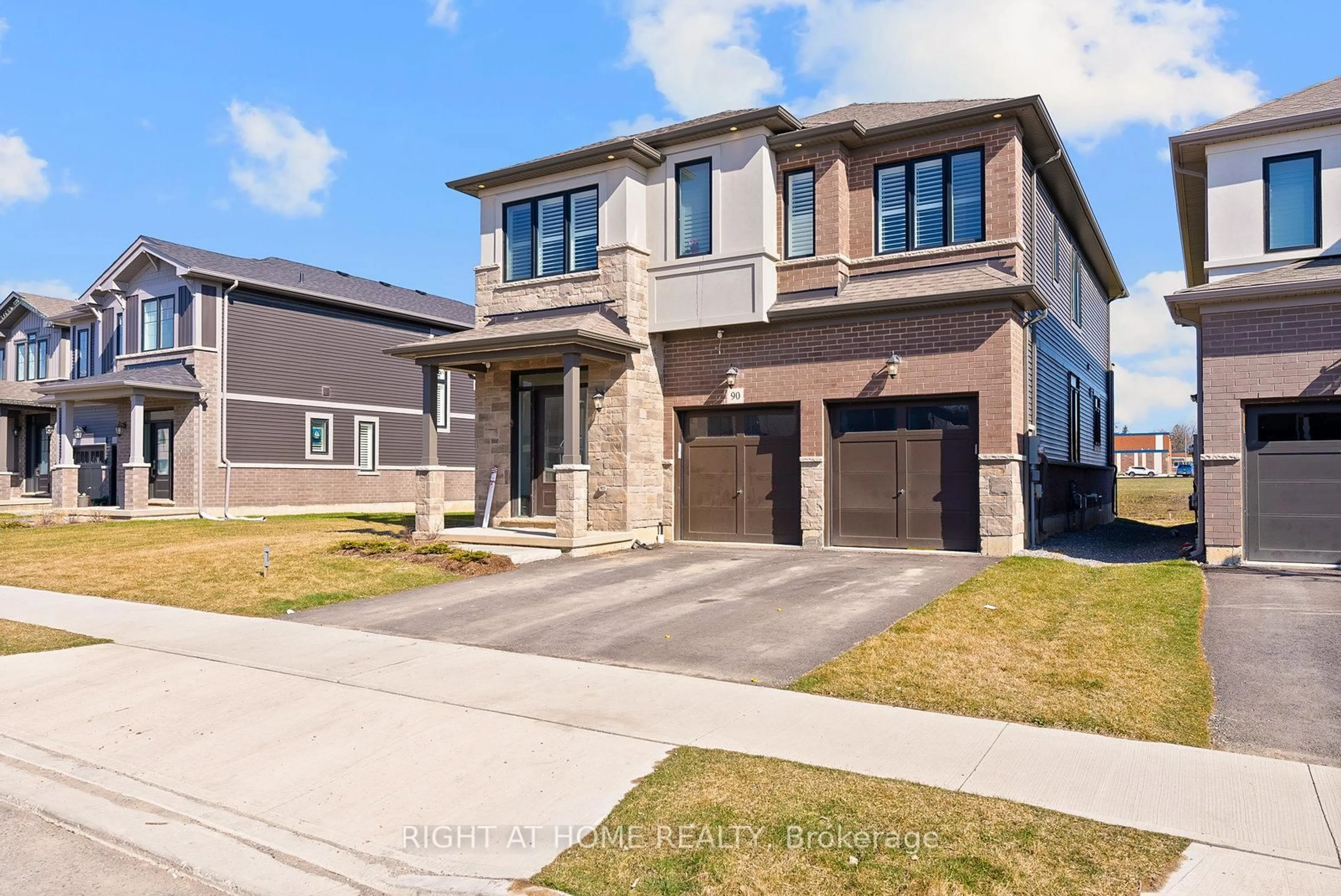 Home with brick exterior material, street for 90 Spitfire Dr, Hamilton Ontario L0R 1W0