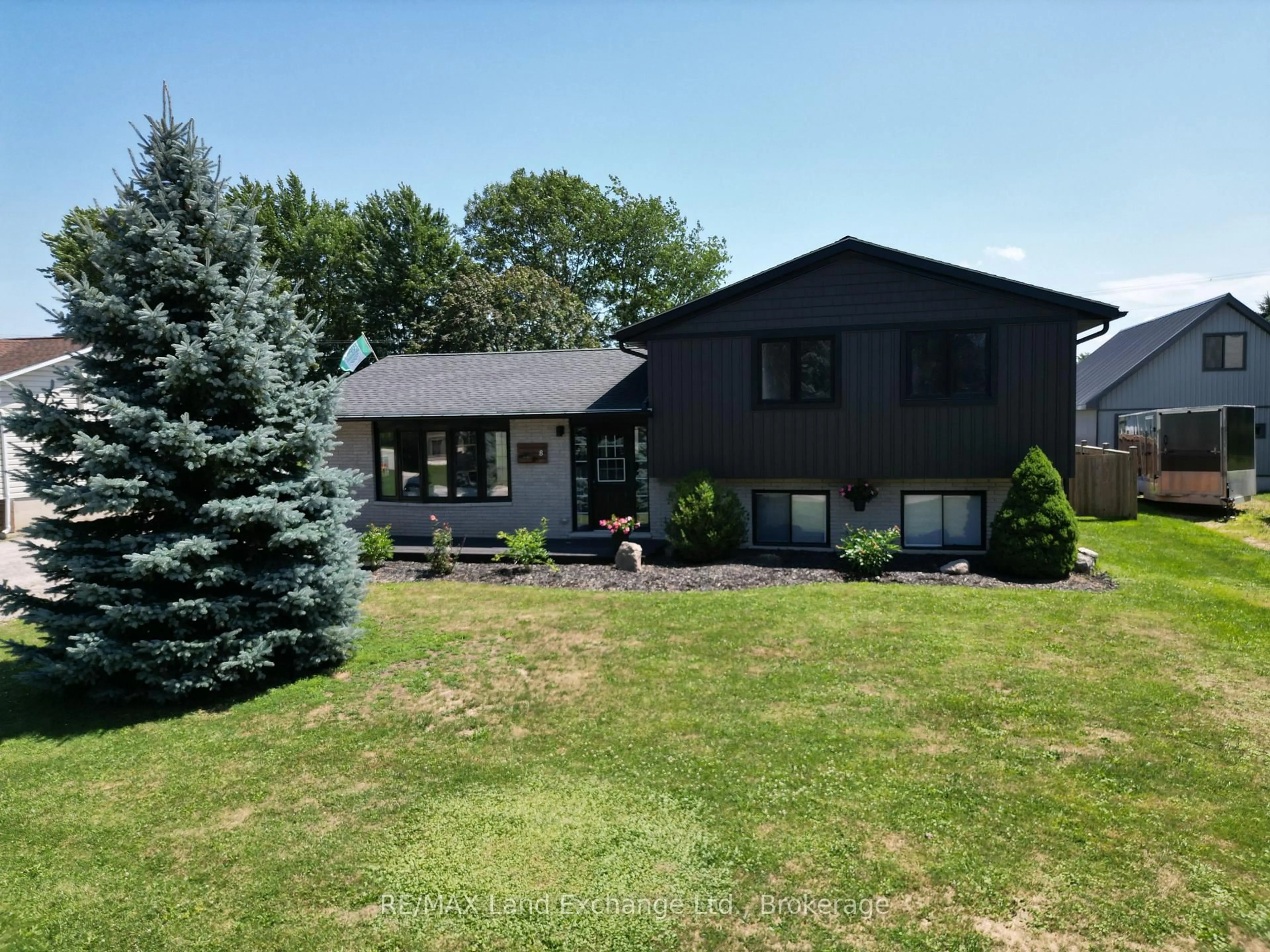 A pic from outside/outdoor area/front of a property/back of a property/a pic from drone, mountain view for 8 William St, Huron-Kinloss Ontario N0G 2R0