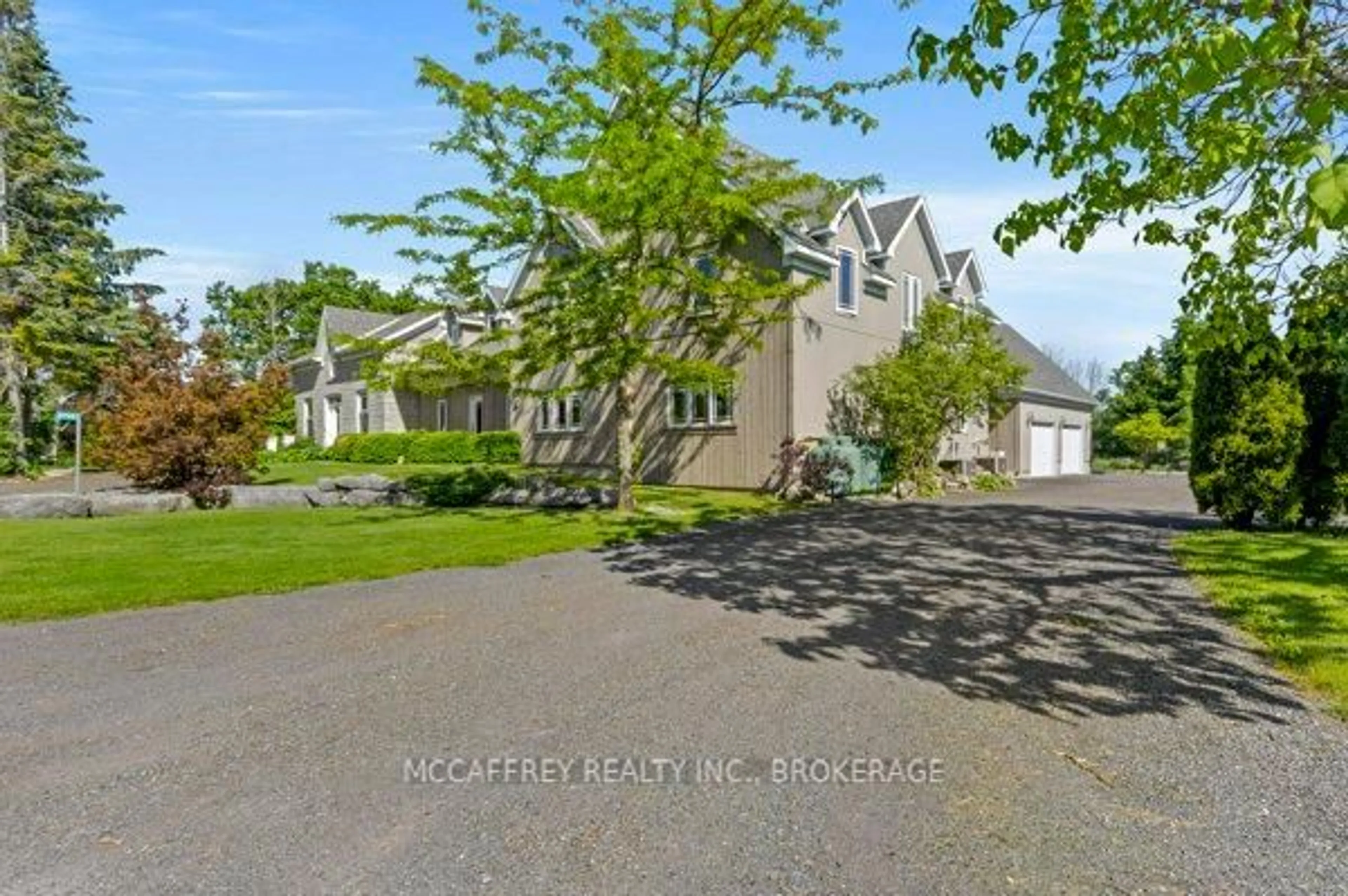 A pic from outside/outdoor area/front of a property/back of a property/a pic from drone, street for 3994 HOWES Rd, Bissett Creek Ontario K0H 2H0