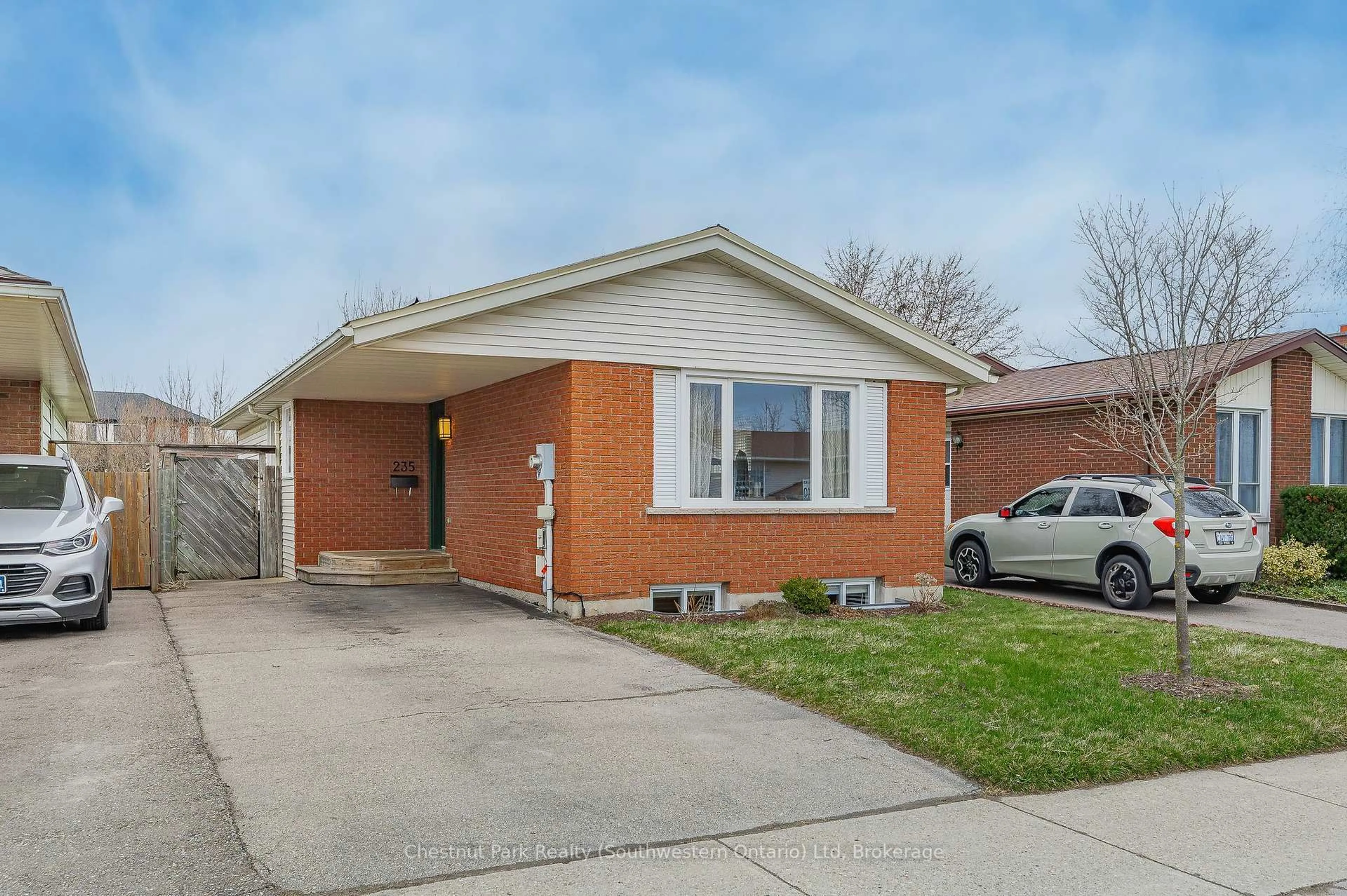 Home with brick exterior material, street for 235 Auden Rd, Guelph Ontario N1E 6N5
