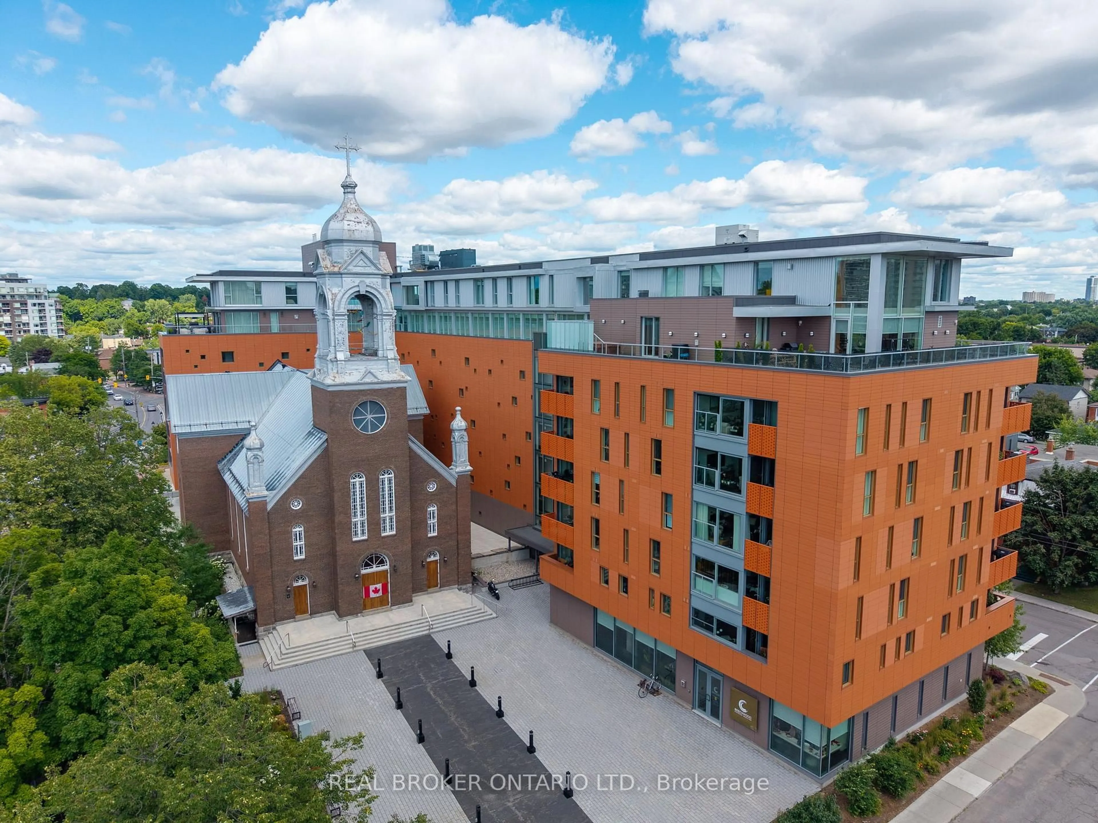 A pic from outside/outdoor area/front of a property/back of a property/a pic from drone, city buildings view from balcony for 135 Barrette St #307, Ottawa Ontario K1L 7Z9