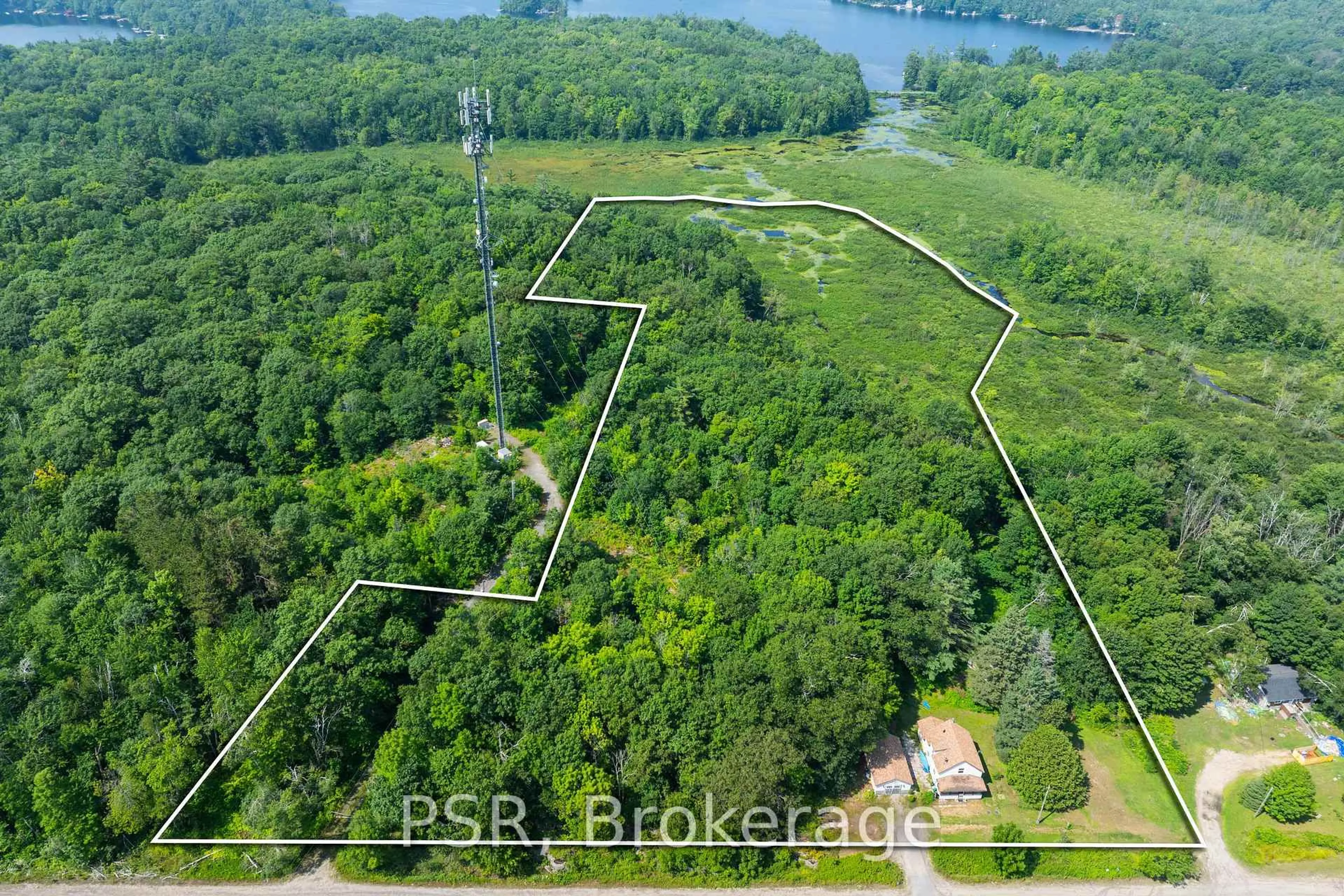 A pic from outside/outdoor area/front of a property/back of a property/a pic from drone, water/lake/river/ocean view for 2676 Muskoka District 169 Rd, Muskoka Lakes Ontario P0C 1M0