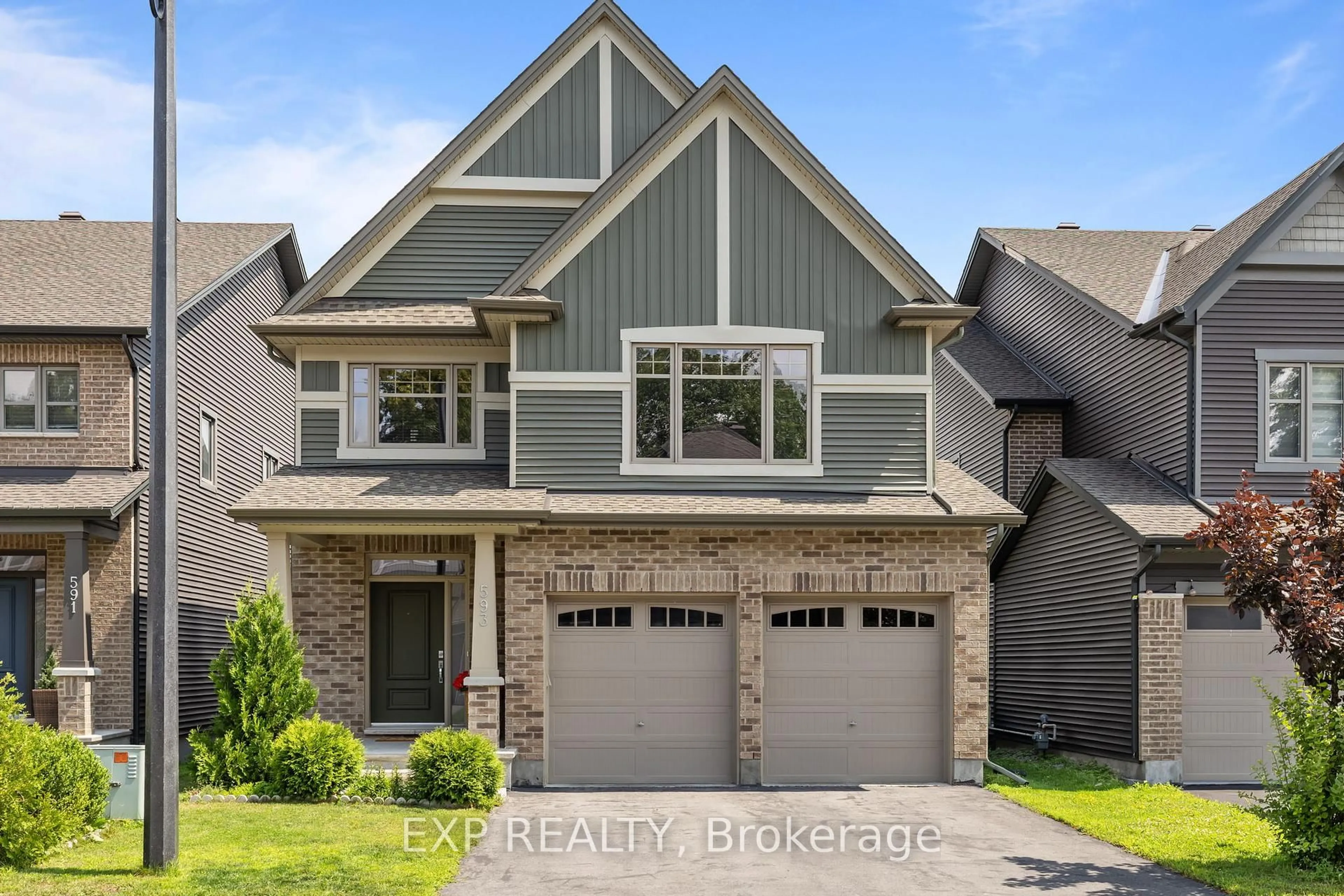 Home with brick exterior material, street for 593 Vivera Pl, Ottawa Ontario K2S 2M9