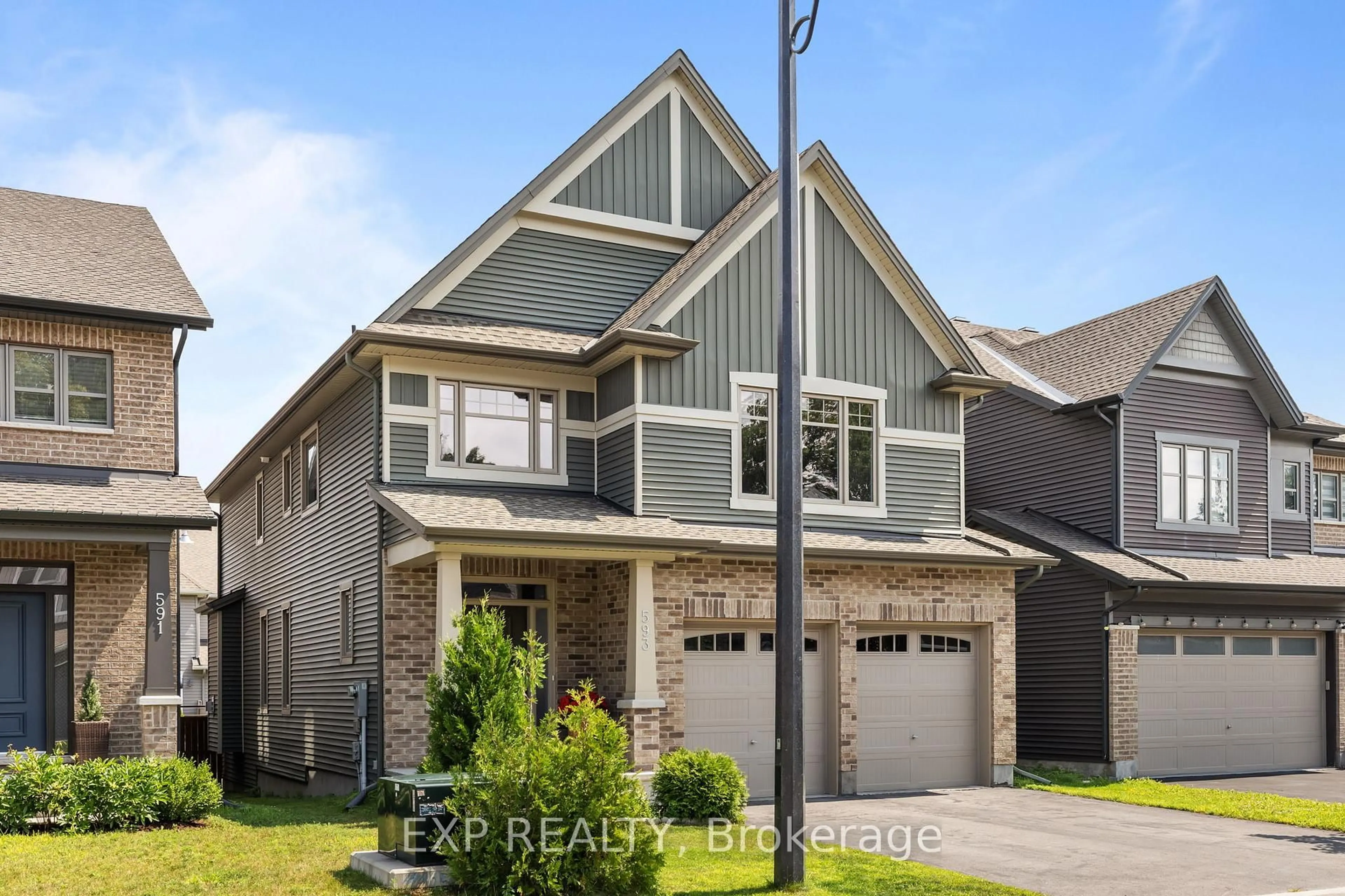 Home with brick exterior material, street for 593 Vivera Pl, Ottawa Ontario K2S 2M9