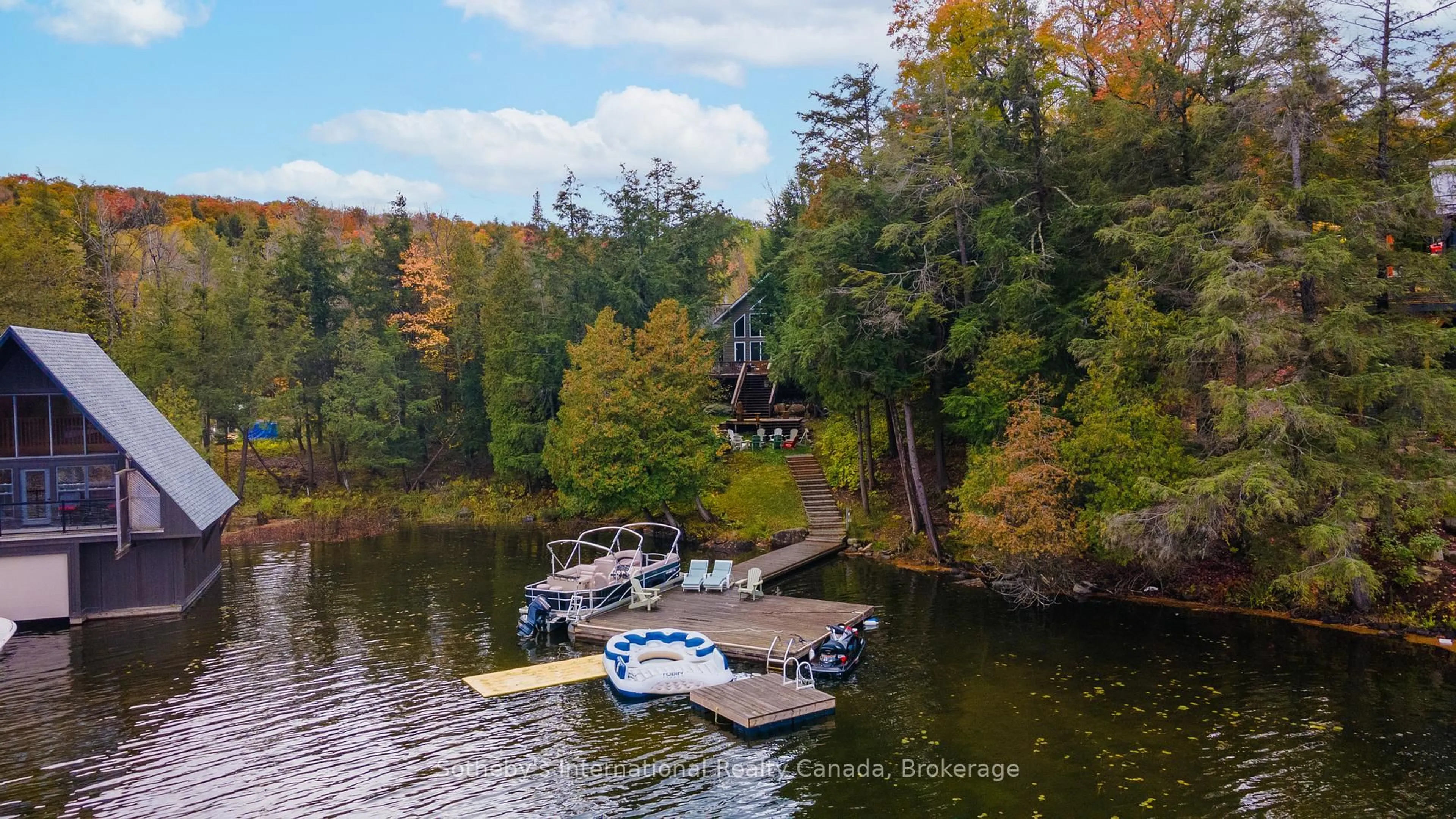 A pic from outside/outdoor area/front of a property/back of a property/a pic from drone, water/lake/river/ocean view for 1010 Ransbury Rd, Muskoka Lakes Ontario P0B 1J0