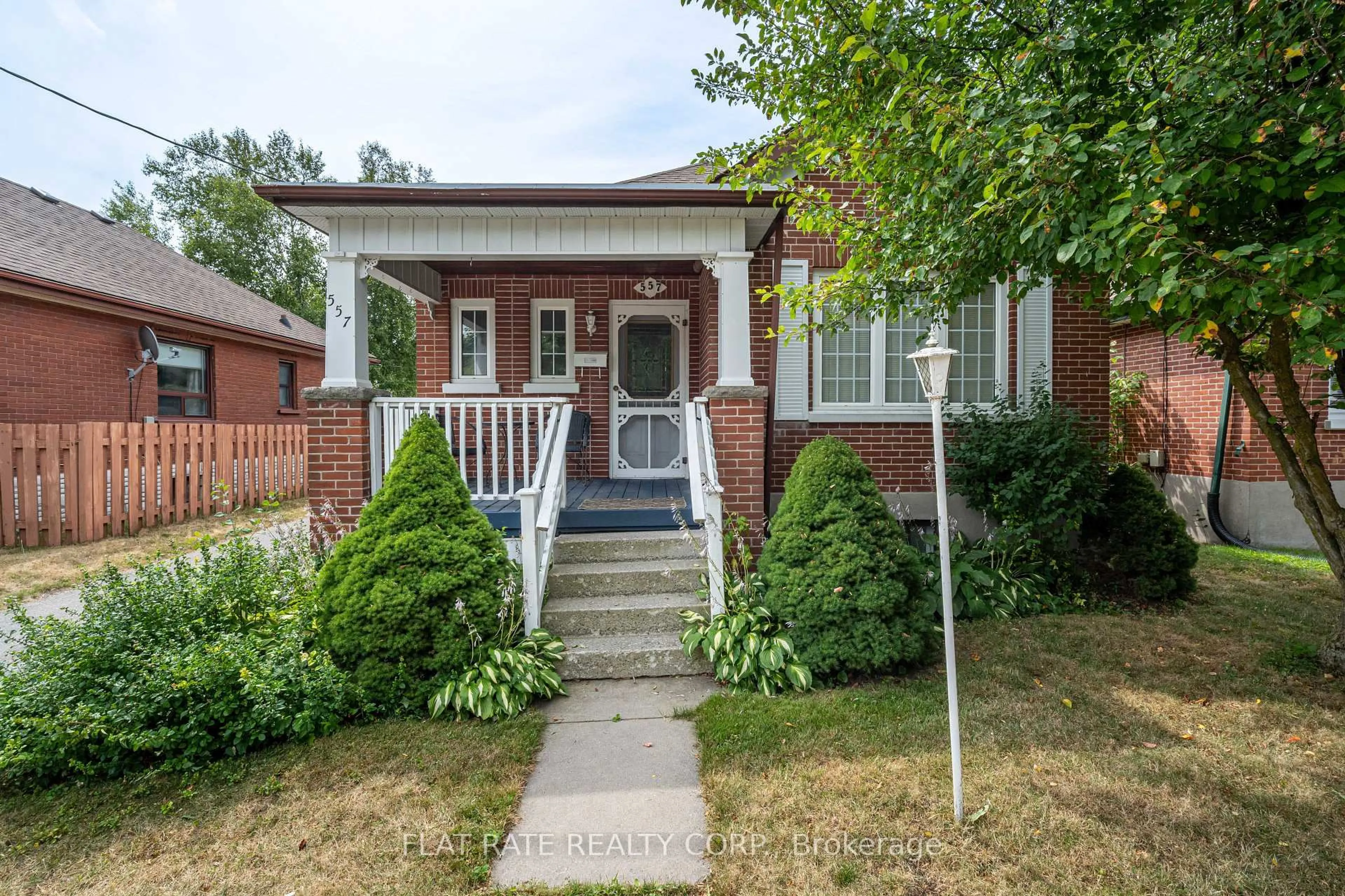 Home with brick exterior material, street for 557 Douglas Ave, Peterborough Central Ontario K9J 4L2
