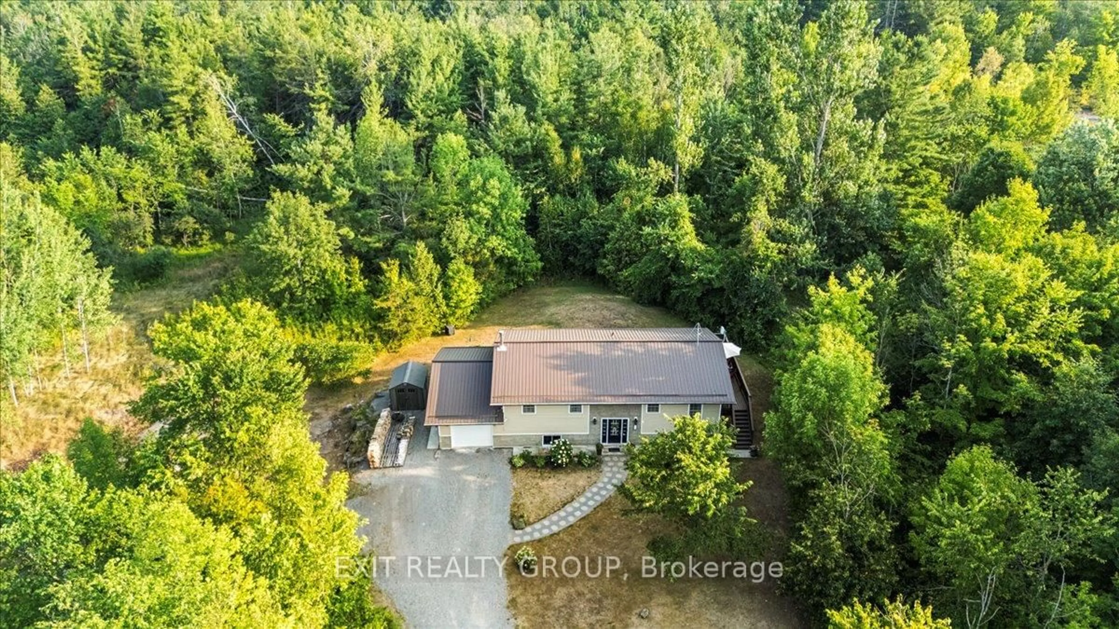 A pic from outside/outdoor area/front of a property/back of a property/a pic from drone, forest/trees view for 1262 Quin-Mo-Lac Rd, Tweed Ontario K0K 3J0