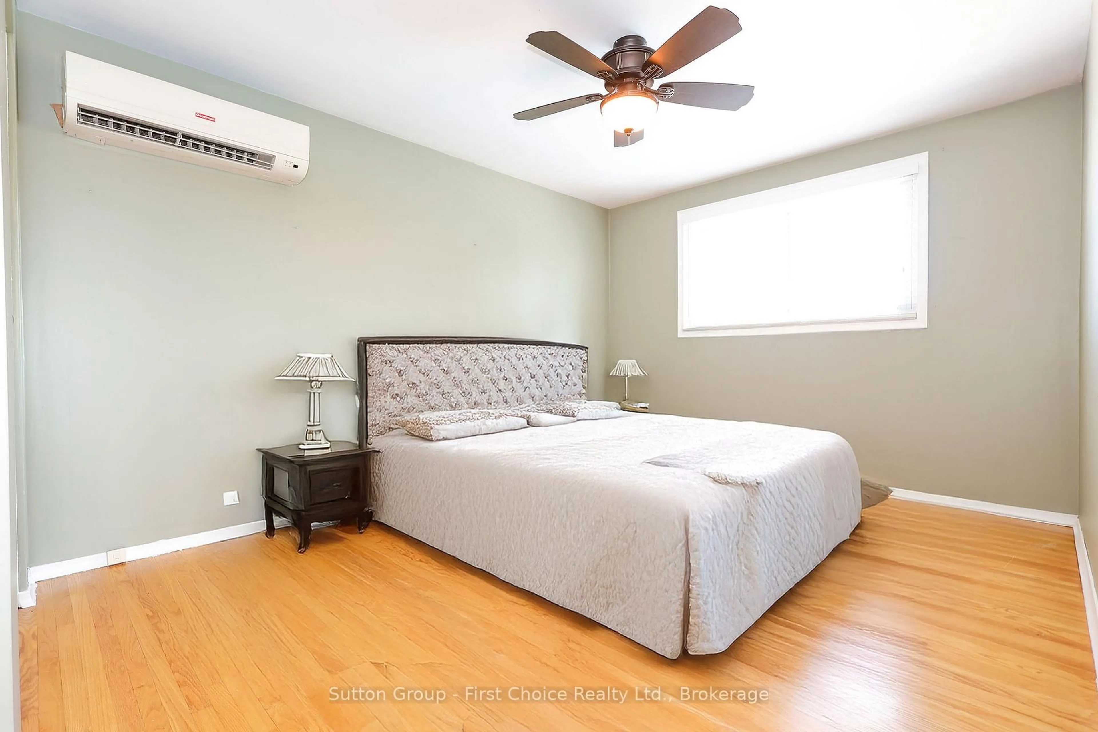 Bedroom with bed, wood/laminate floor for 292 Redford Cres, Stratford Ontario N5A 1P5