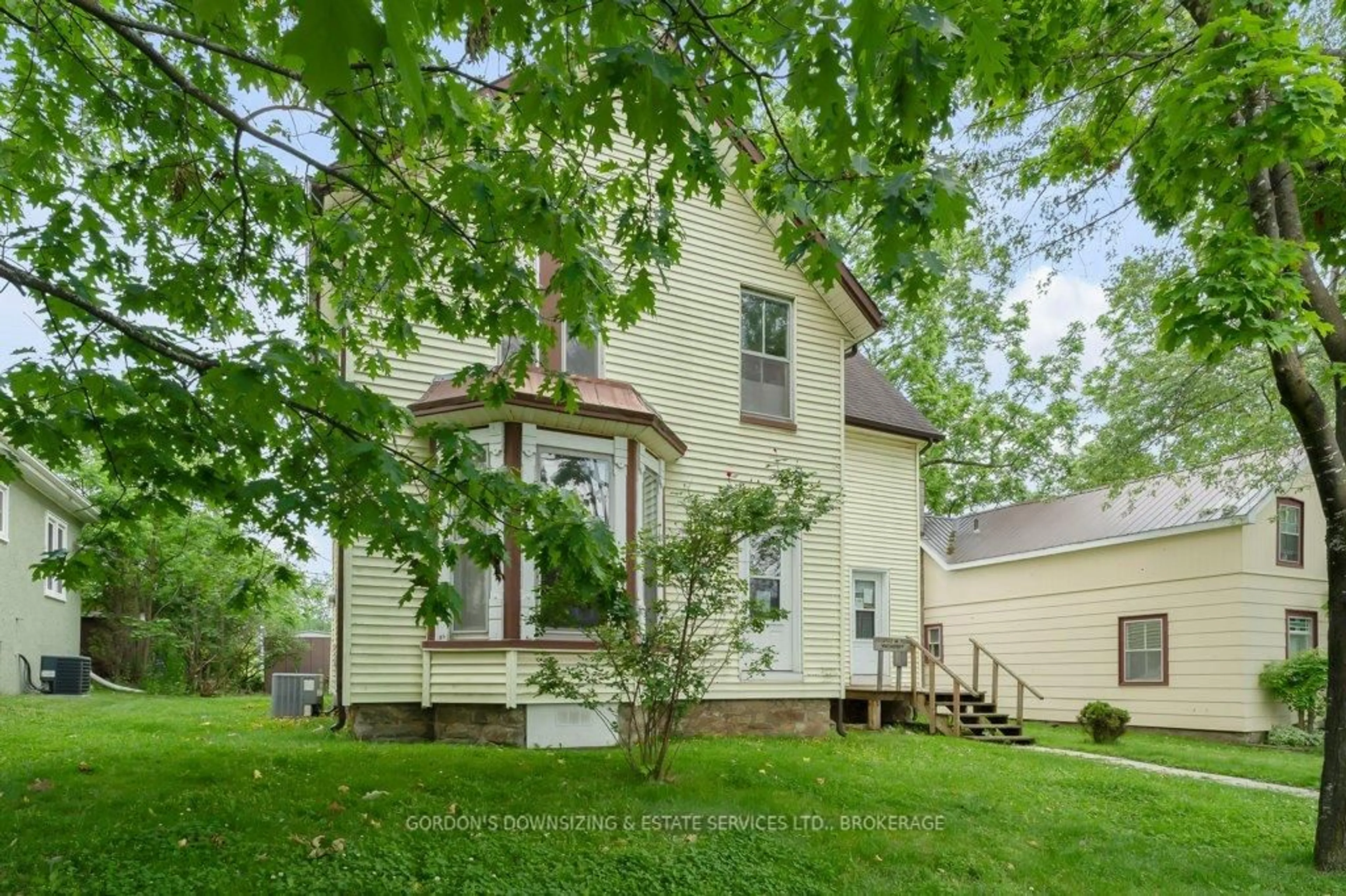 Home with vinyl exterior material, street for 221 Garden St, Gananoque Ontario K7G 1J3