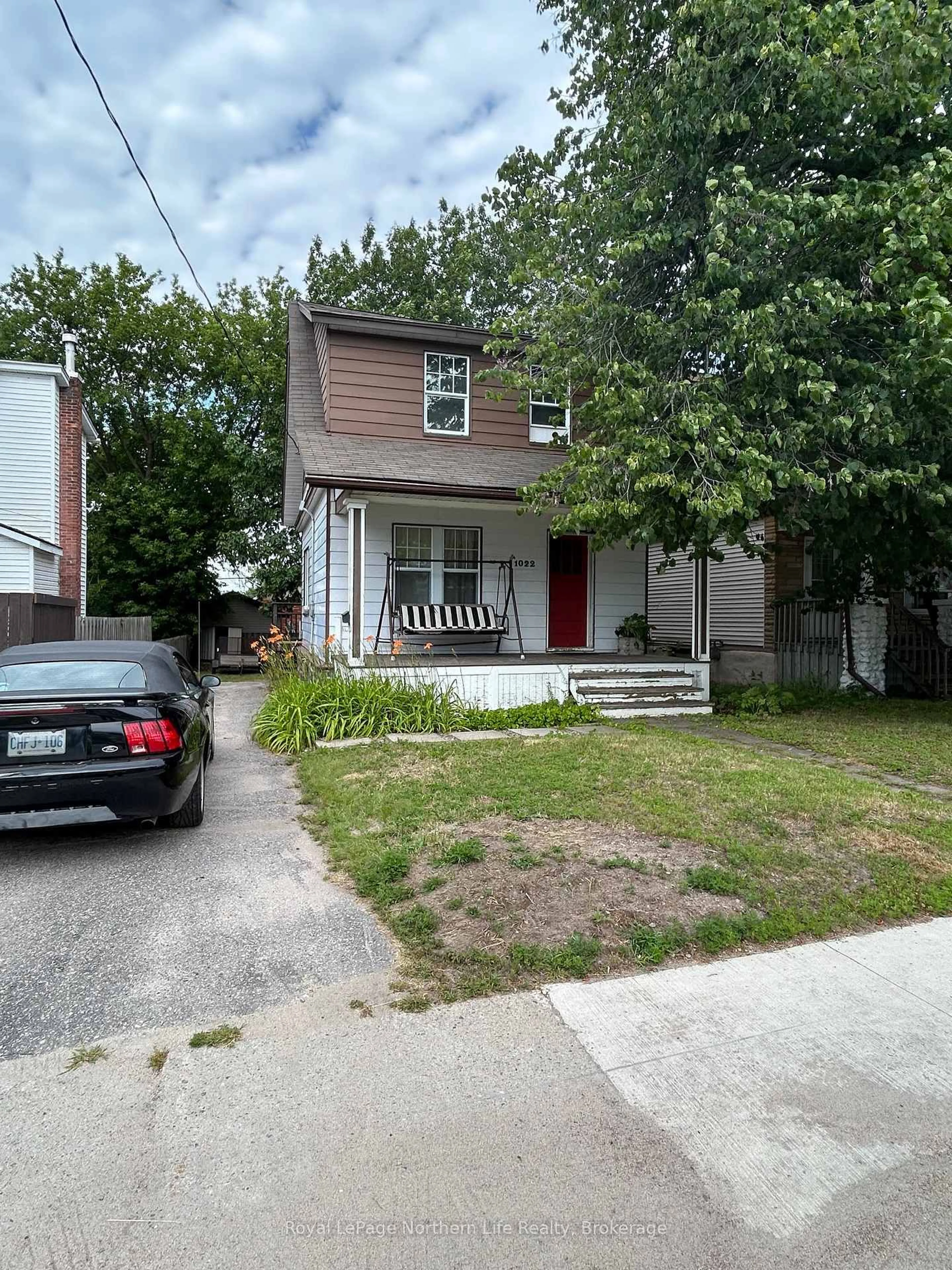 A pic from outside/outdoor area/front of a property/back of a property/a pic from drone, street for 1022 Maher St, North Bay Ontario P1B 2L7