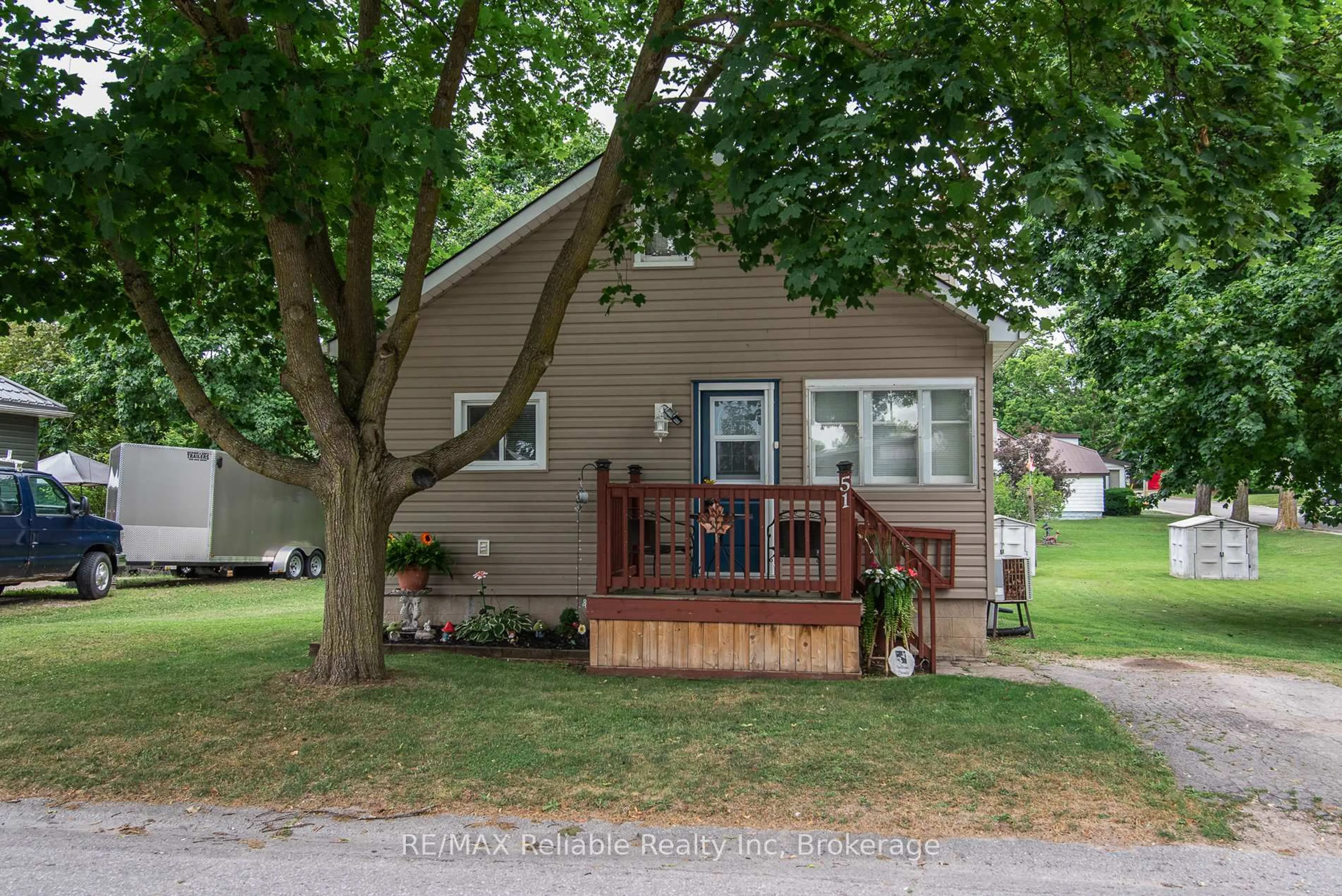 Home with vinyl exterior material, street for 51 Dunlop St, Central Huron Ontario N0M 1L0