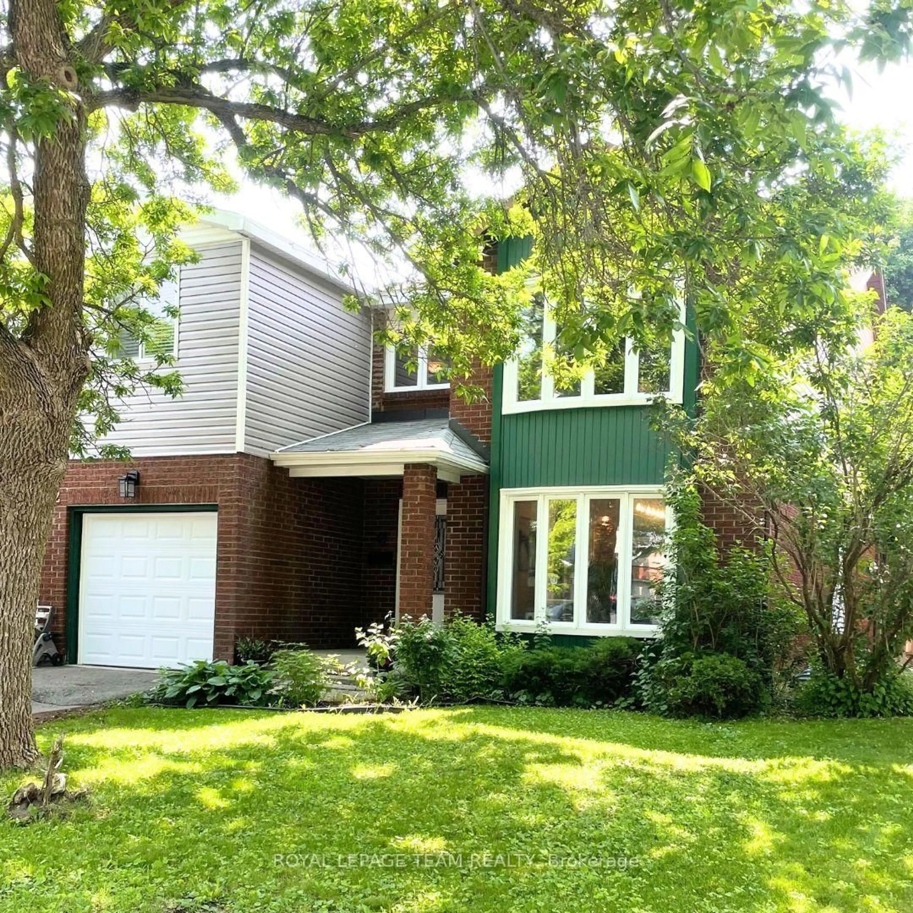 Home with brick exterior material, street for 62 Pittaway Ave, Ottawa Ontario K1G 4N9