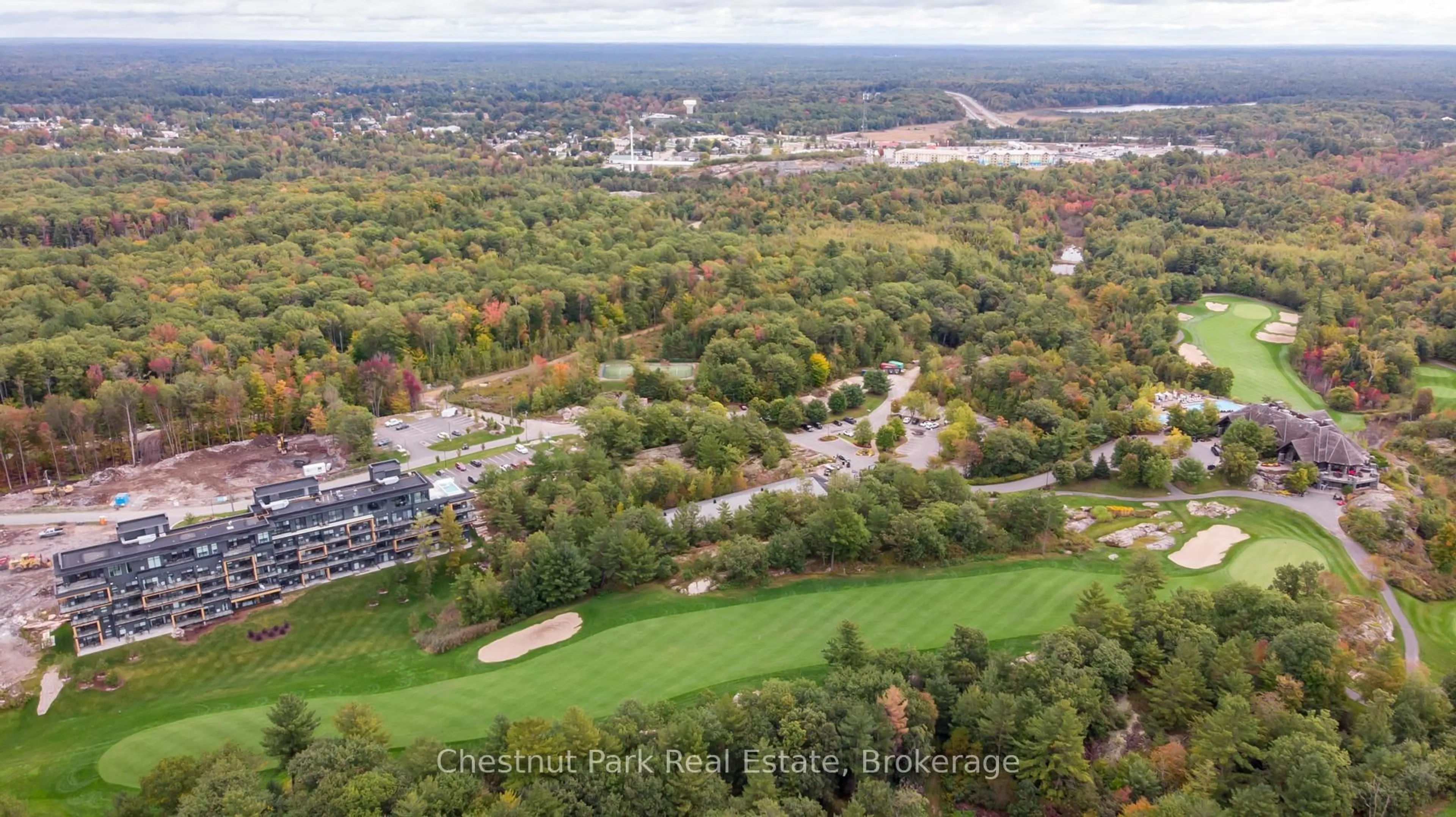 A pic from outside/outdoor area/front of a property/back of a property/a pic from drone, unknown for 120 Carrick Tr #404, Gravenhurst Ontario P1P 0B6