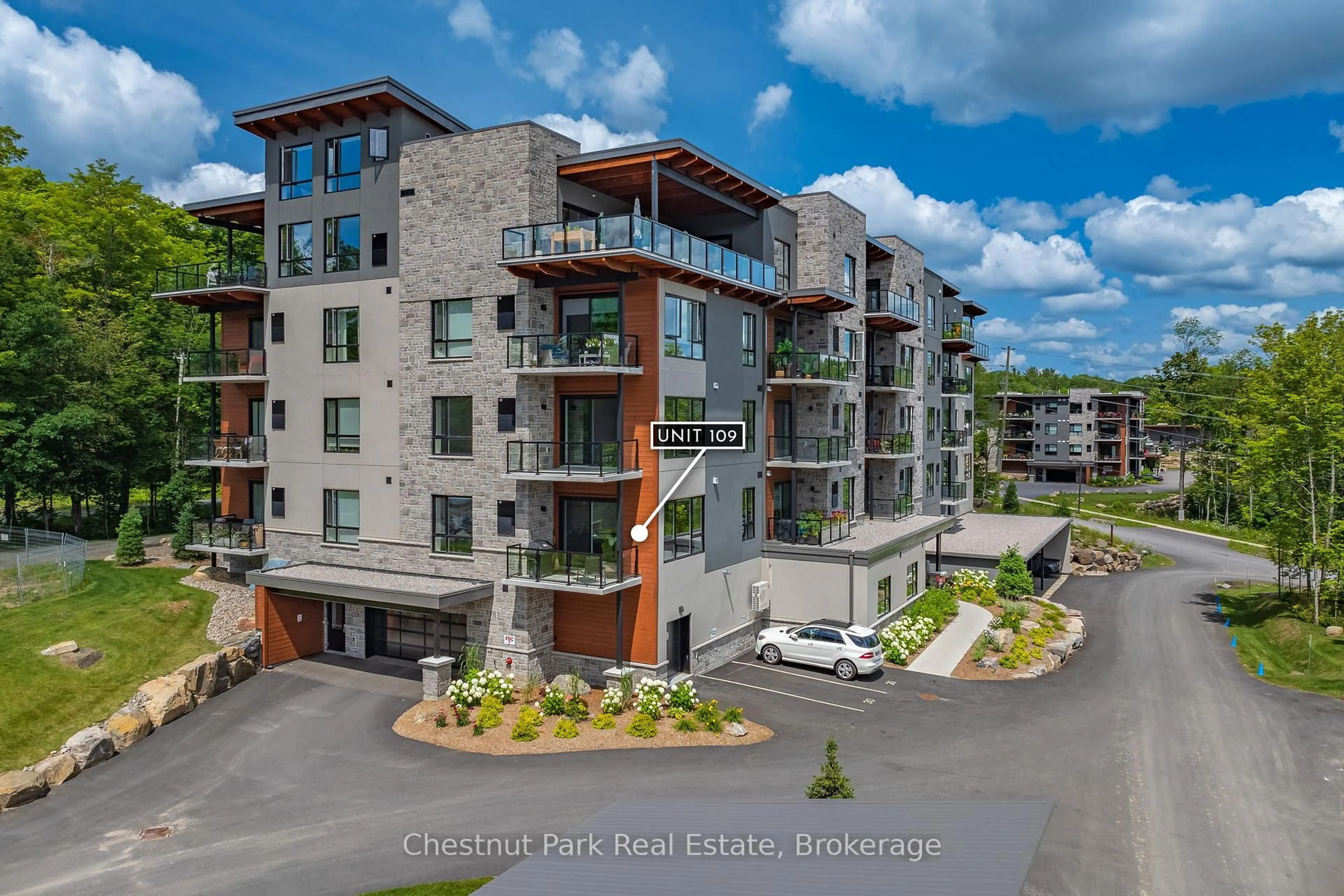 A pic from outside/outdoor area/front of a property/back of a property/a pic from drone, water/lake/river/ocean view for 18 CAMPUS Tr #109, Huntsville Ontario P1H 0K2