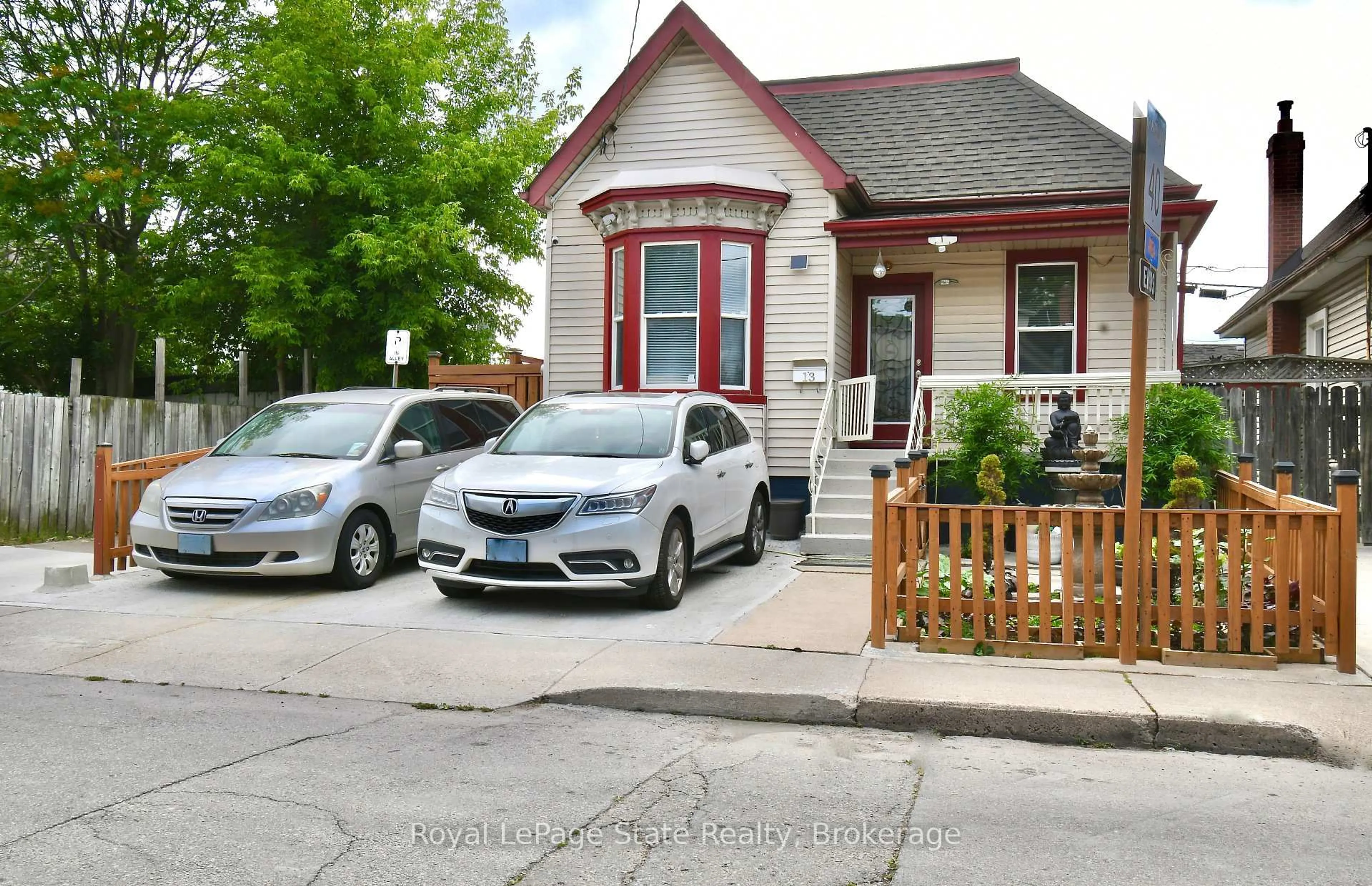 A pic from outside/outdoor area/front of a property/back of a property/a pic from drone, street for 13 Leeming St, Hamilton Ontario L8L 5T4