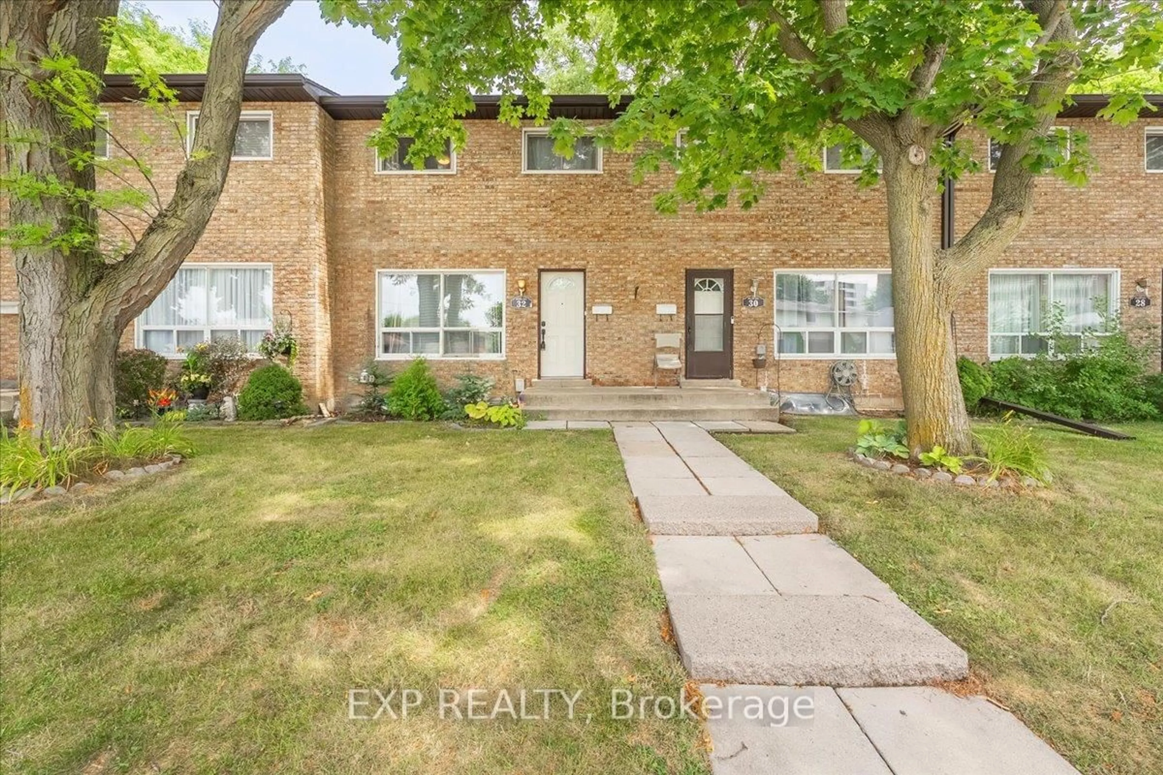 Home with brick exterior material, street for 32 Riverdale Dr, Hamilton Ontario L8E 1J8