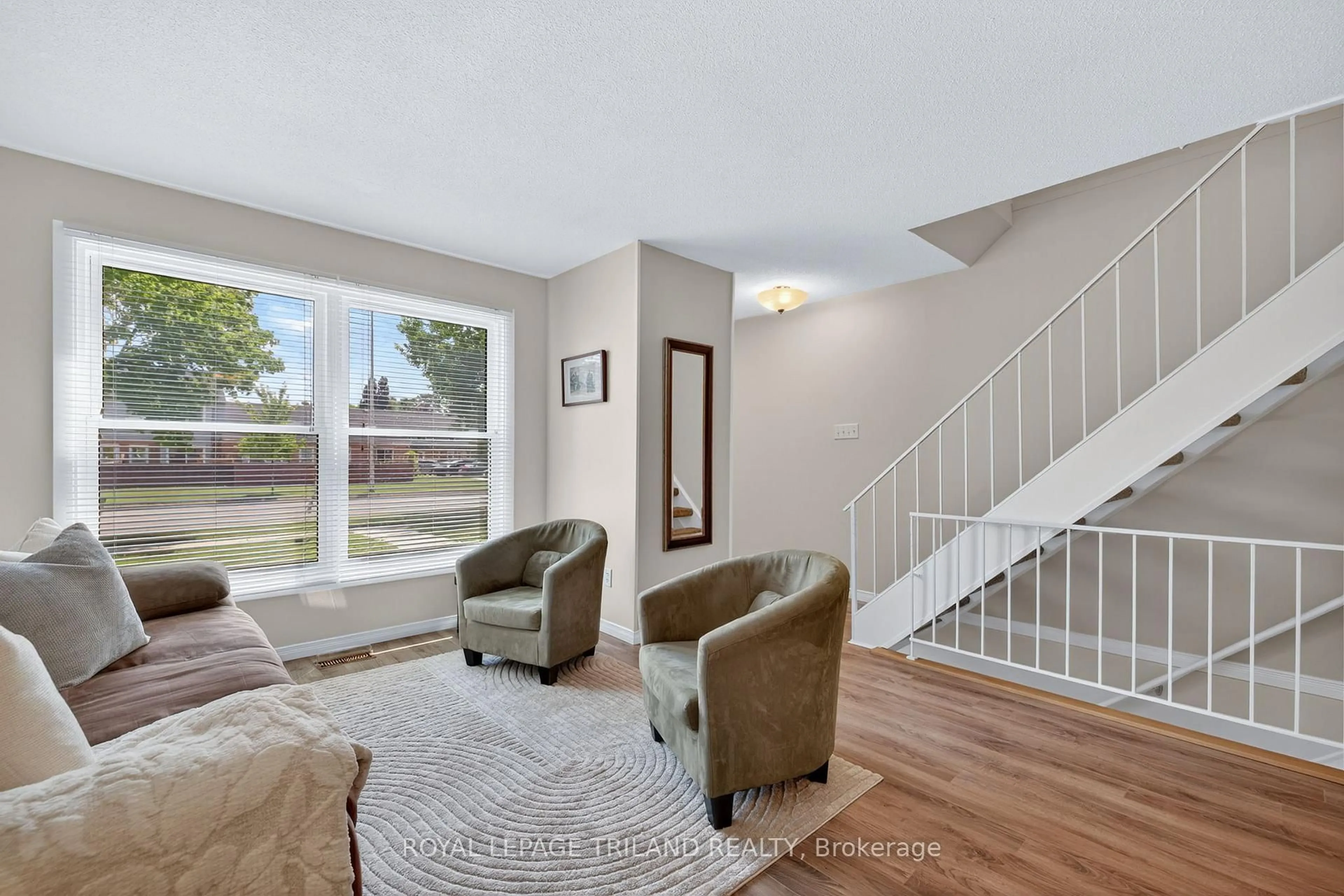 Living room with furniture, unknown for 782 Viscount Rd #22, London South Ontario N6J 4E7