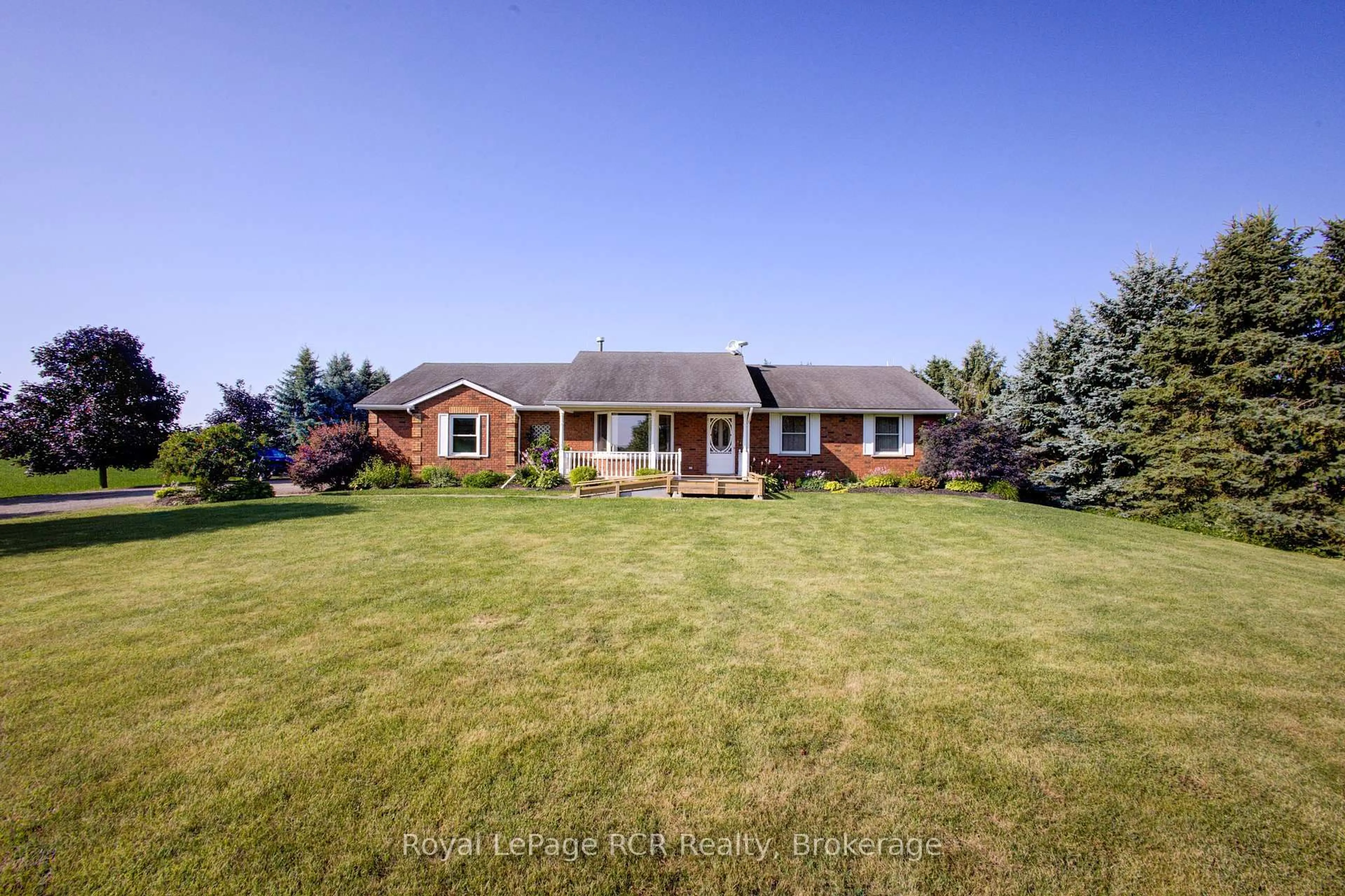 A pic from outside/outdoor area/front of a property/back of a property/a pic from drone, unknown for 7218 16th Line, Mapleton Ontario N0G 1A0