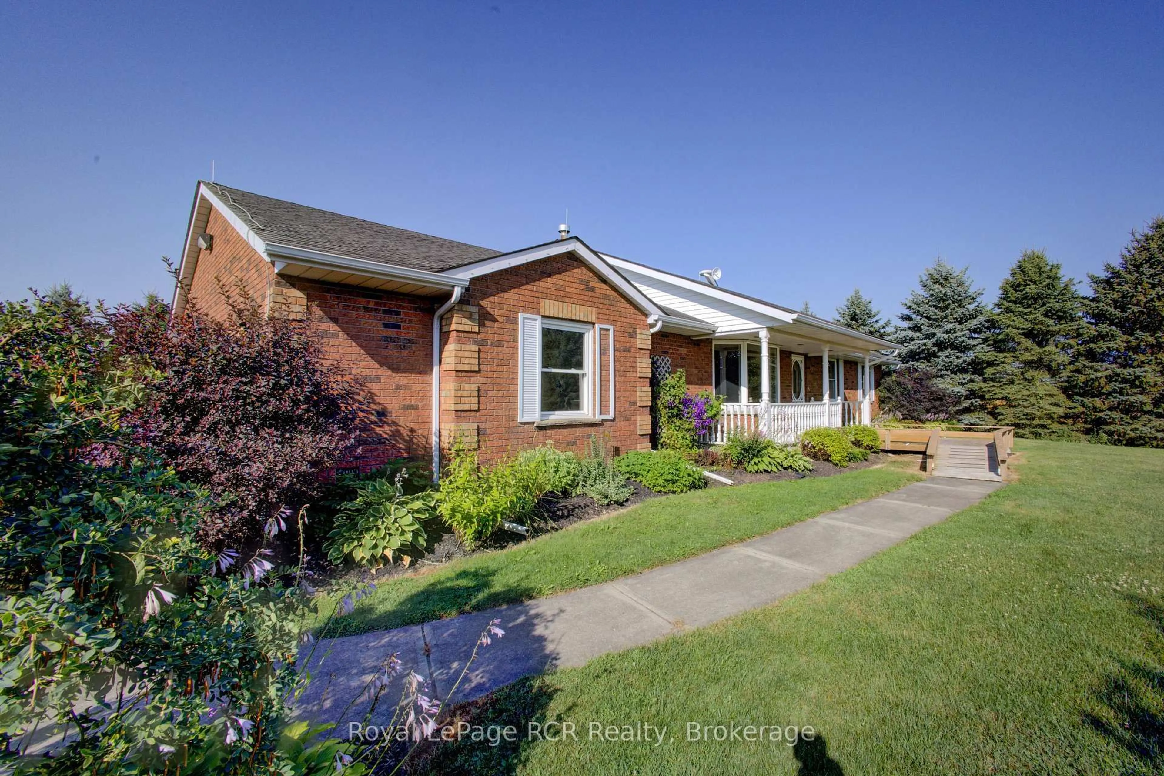 Home with brick exterior material, street for 7218 16th Line, Mapleton Ontario N0G 1A0