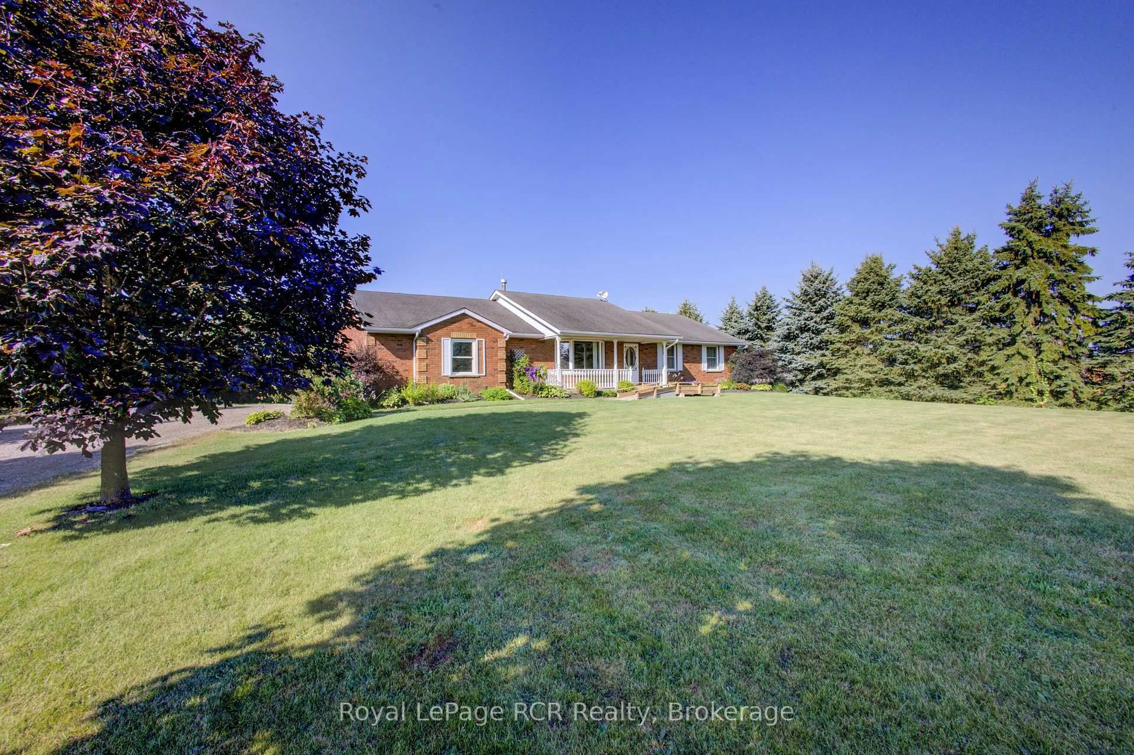 A pic from outside/outdoor area/front of a property/back of a property/a pic from drone, unknown for 7218 16th Line, Mapleton Ontario N0G 1A0