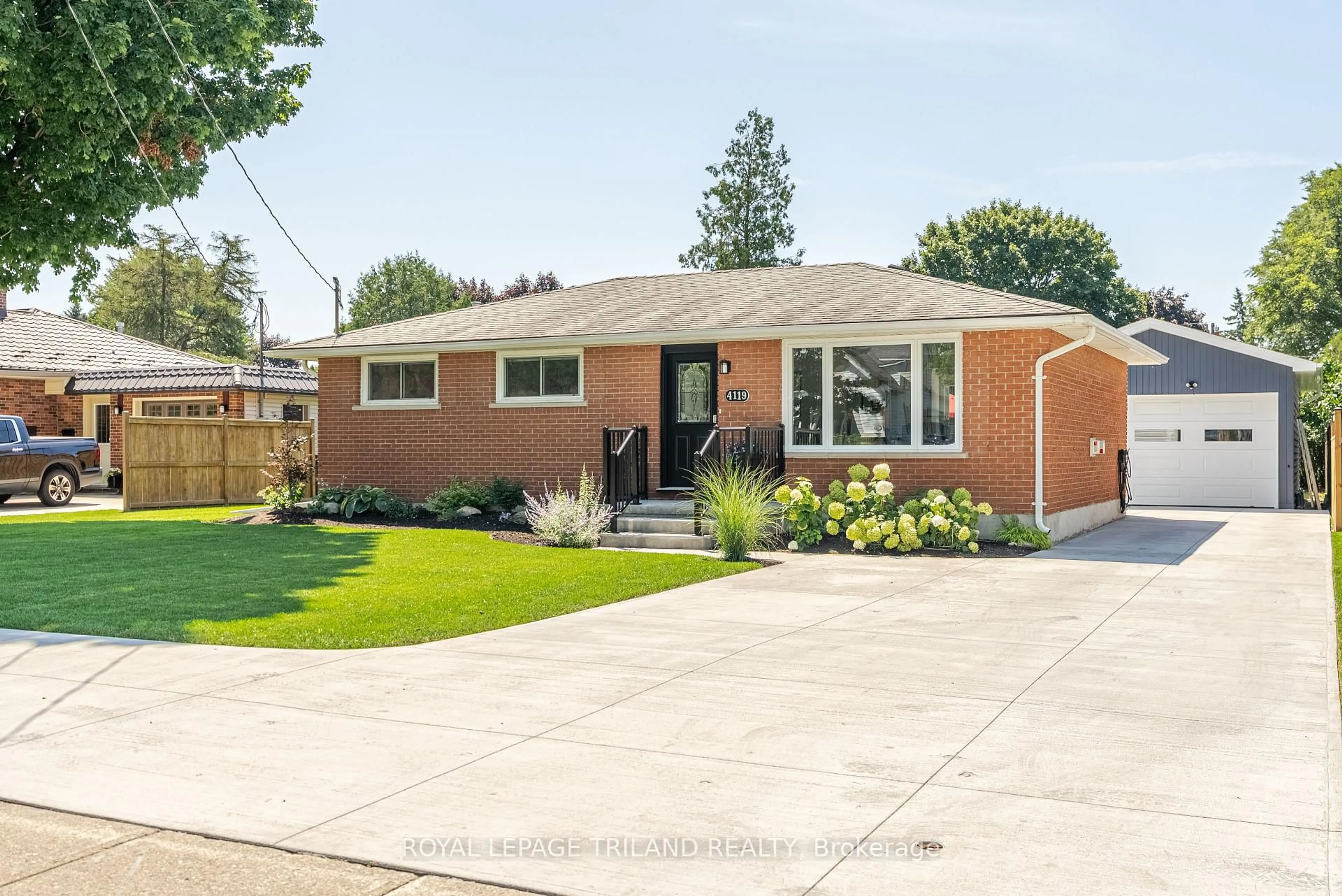 Home with brick exterior material, street for 4119 Hamilton Rd, Thames Centre Ontario N0L 1G2