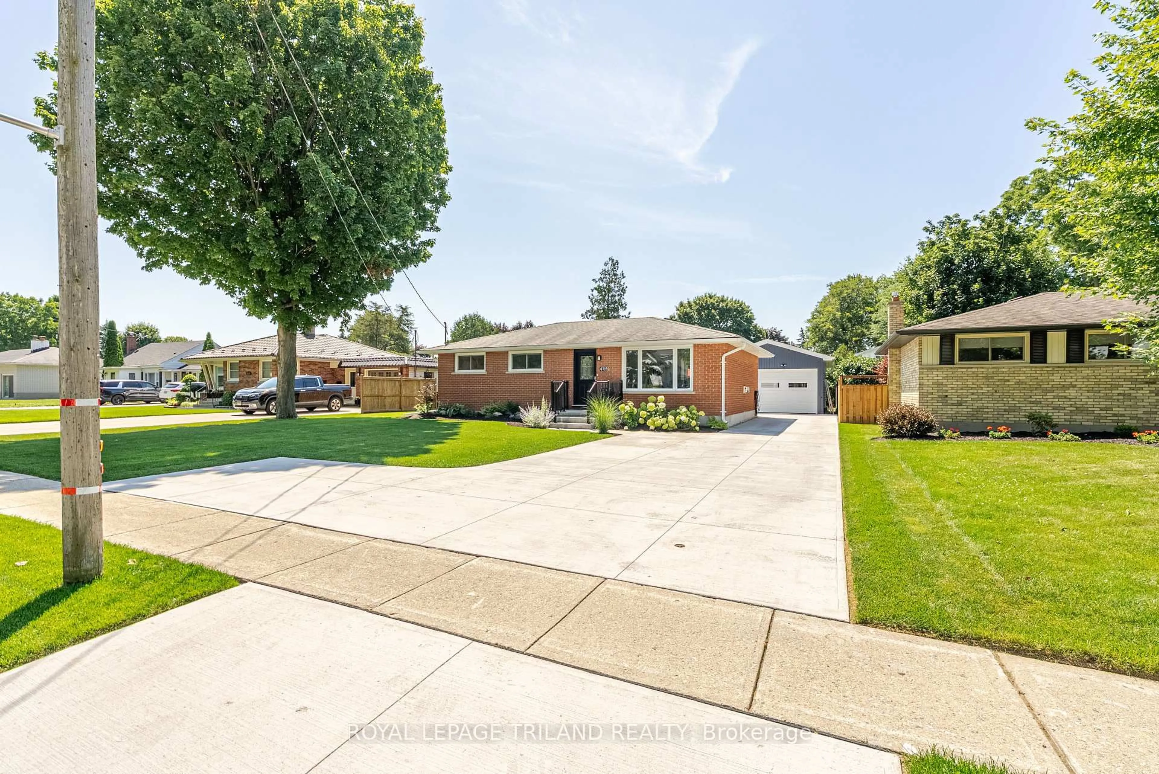 Home with brick exterior material, street for 4119 Hamilton Rd, Thames Centre Ontario N0L 1G2