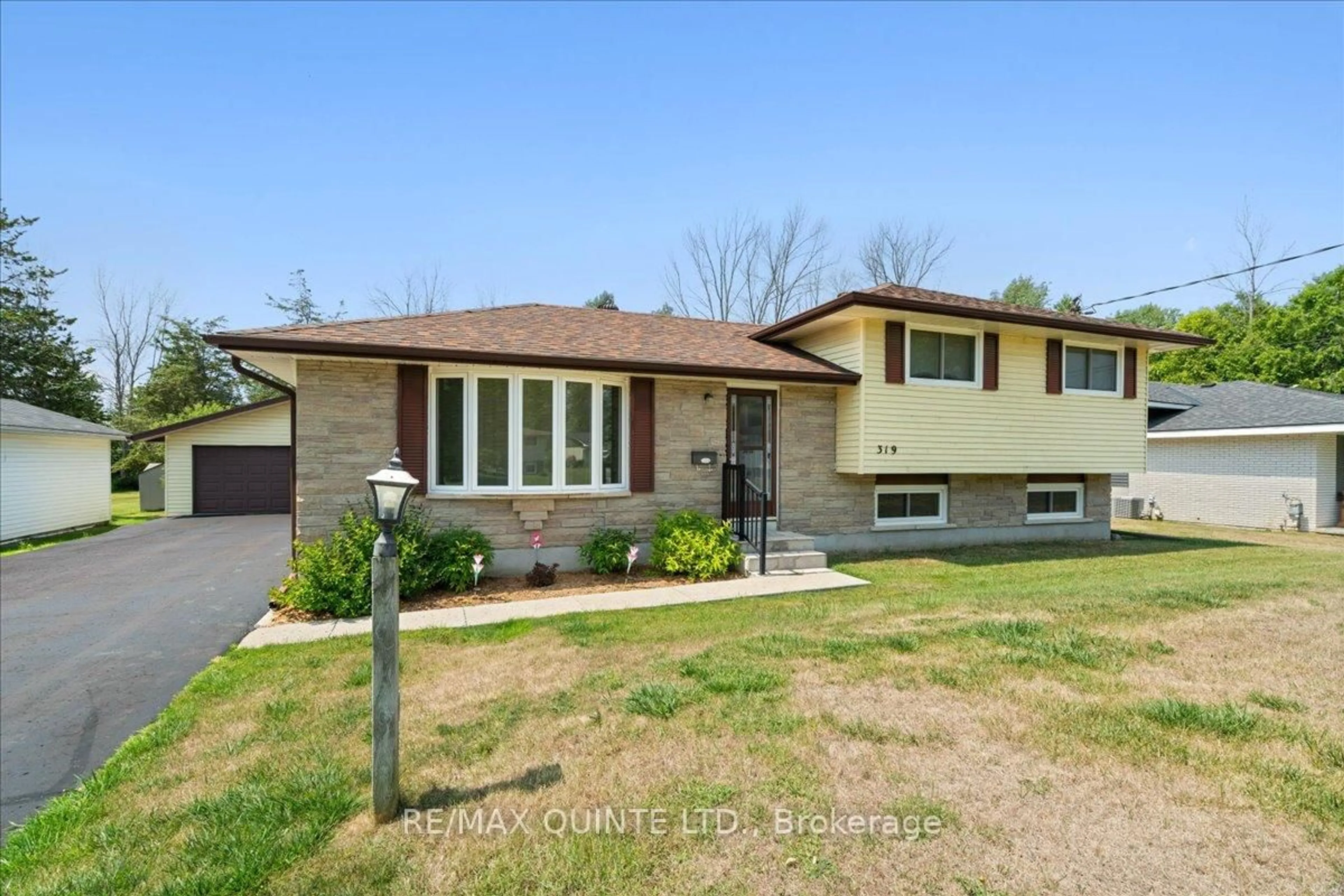 Home with brick exterior material, street for 319 Montrose Rd, Quinte West Ontario K8R 1A8