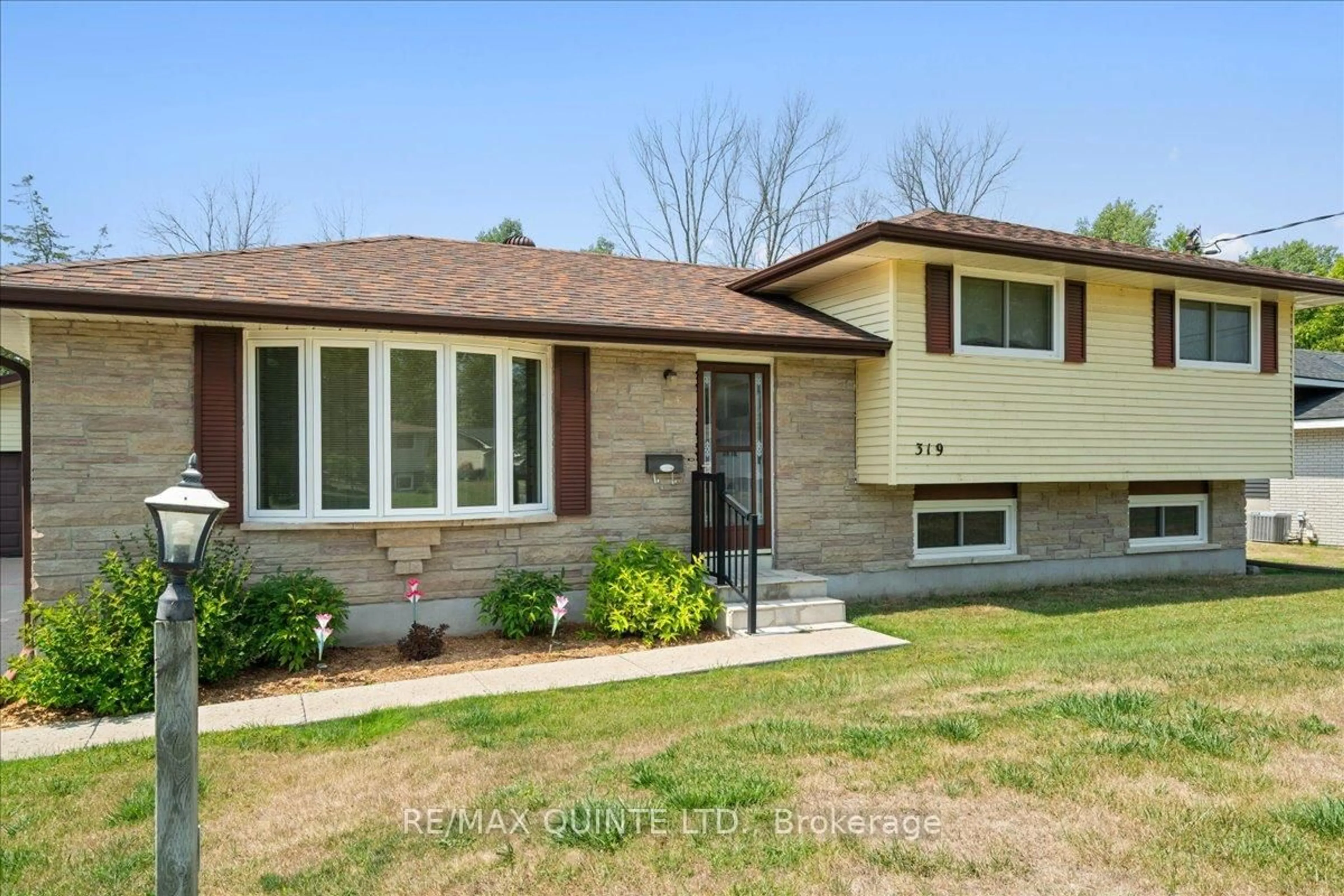 Home with brick exterior material, street for 319 Montrose Rd, Quinte West Ontario K8R 1A8