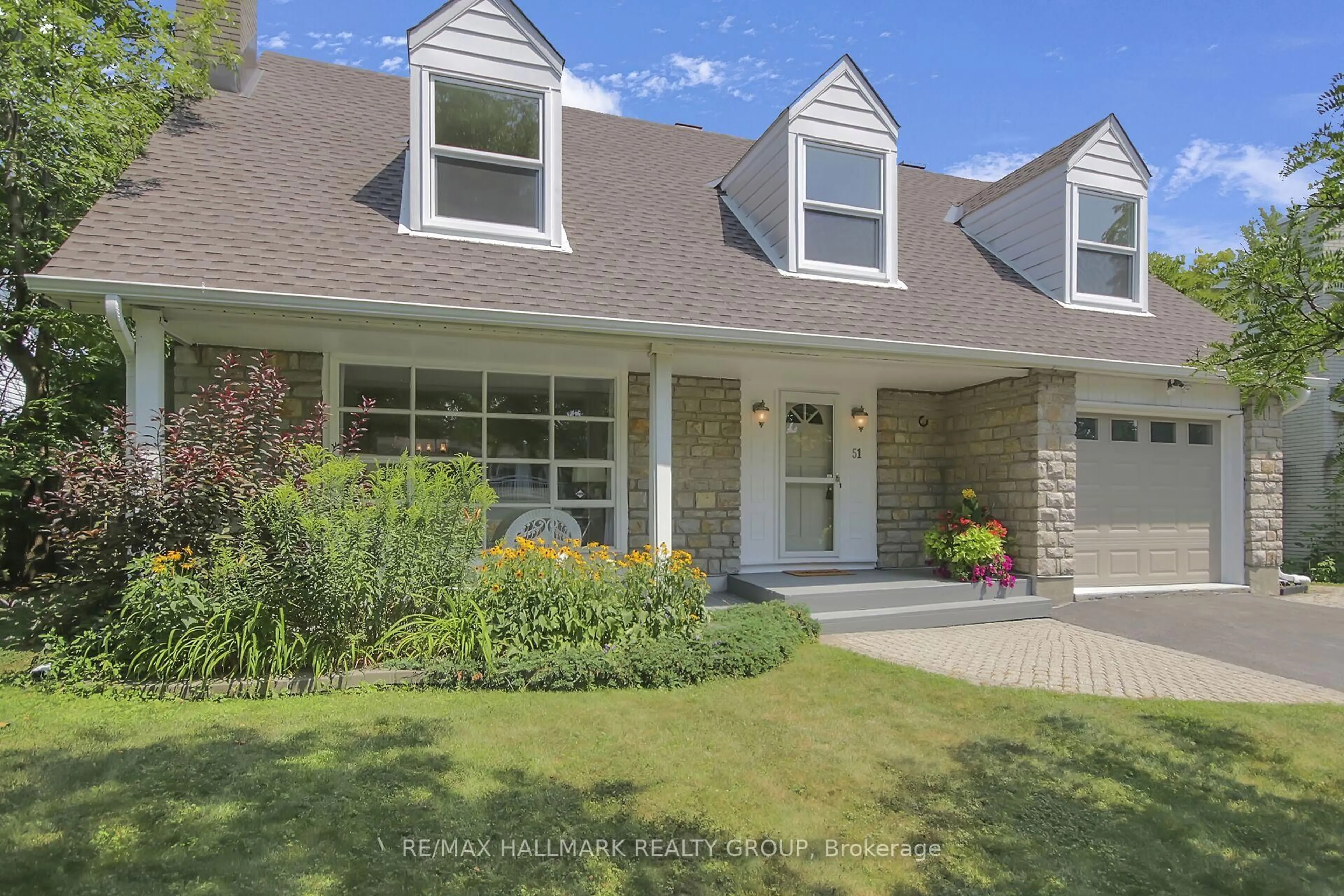 Home with vinyl exterior material, street for 51 Charkay St, Ottawa Ontario K2E 5N5