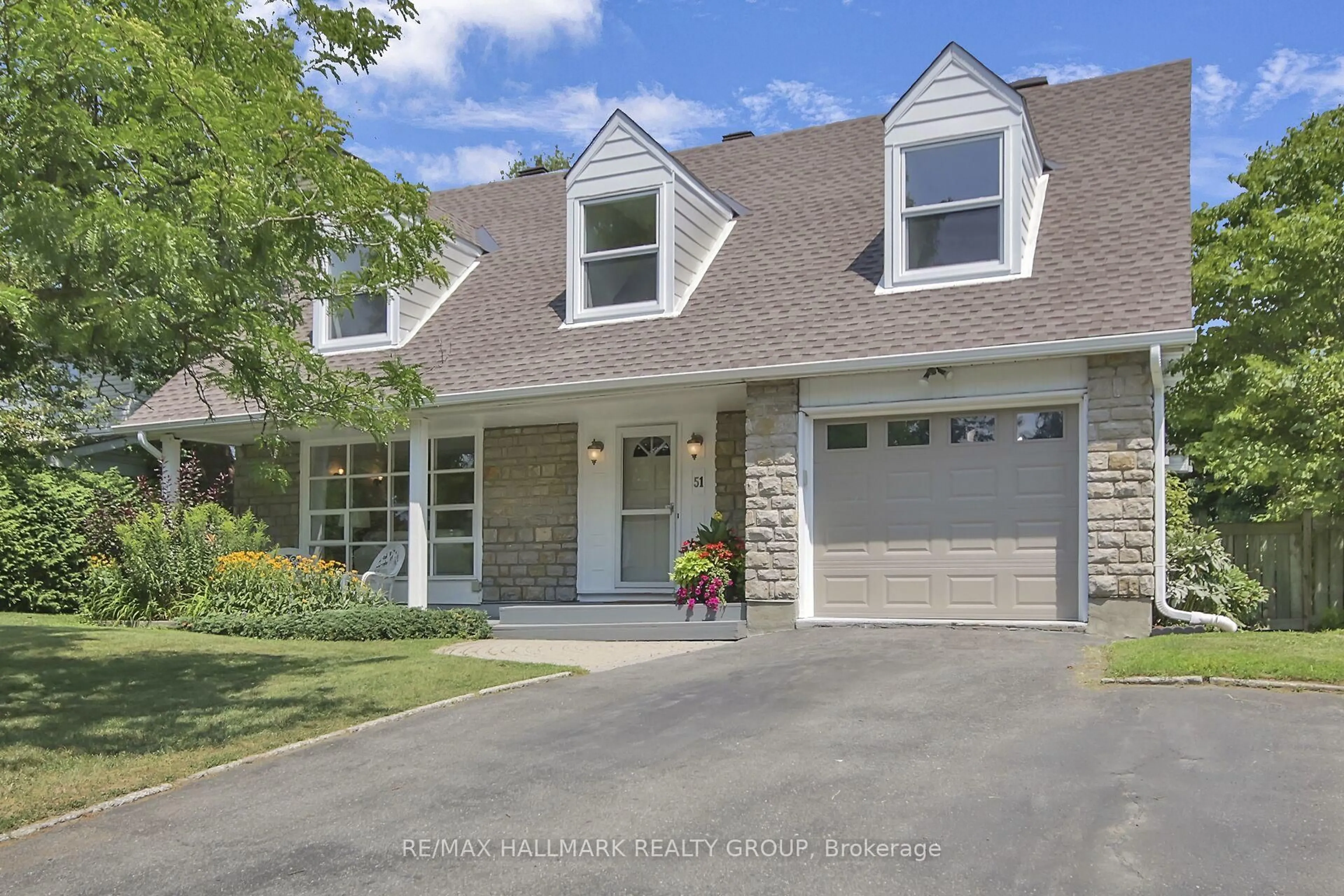 Home with vinyl exterior material, street for 51 Charkay St, Ottawa Ontario K2E 5N5