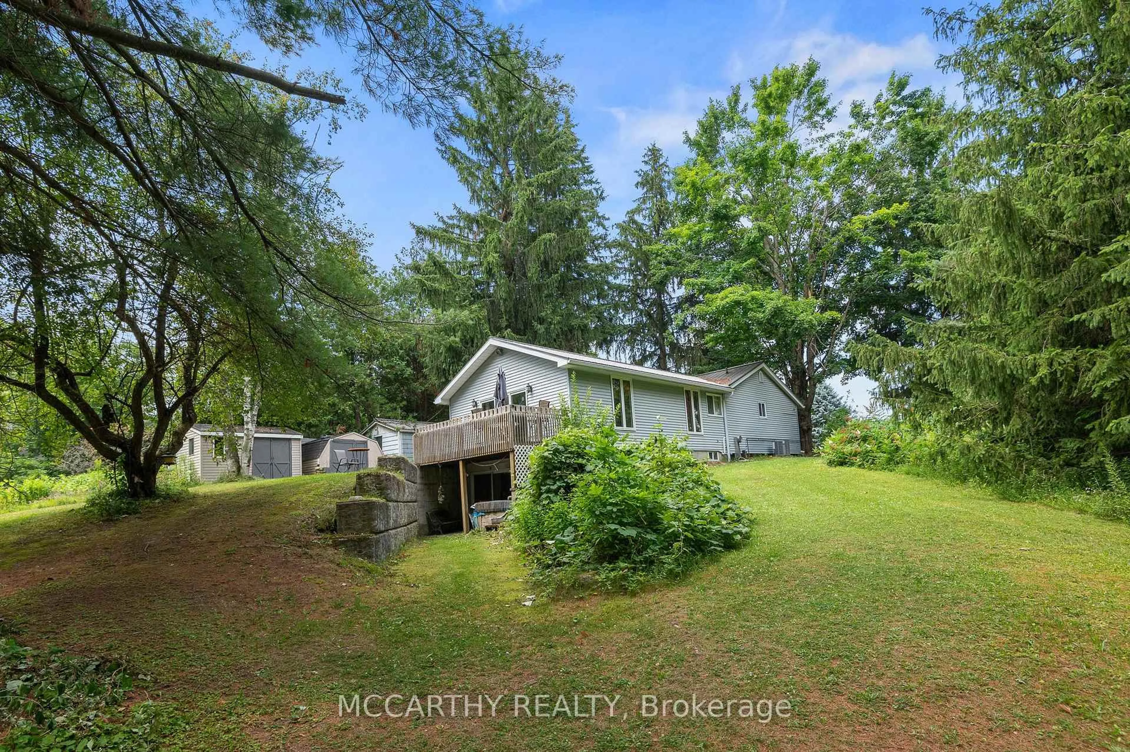 A pic from outside/outdoor area/front of a property/back of a property/a pic from drone, unknown for 21 McCutcheon Rd, Mulmur Ontario L9V 3E8
