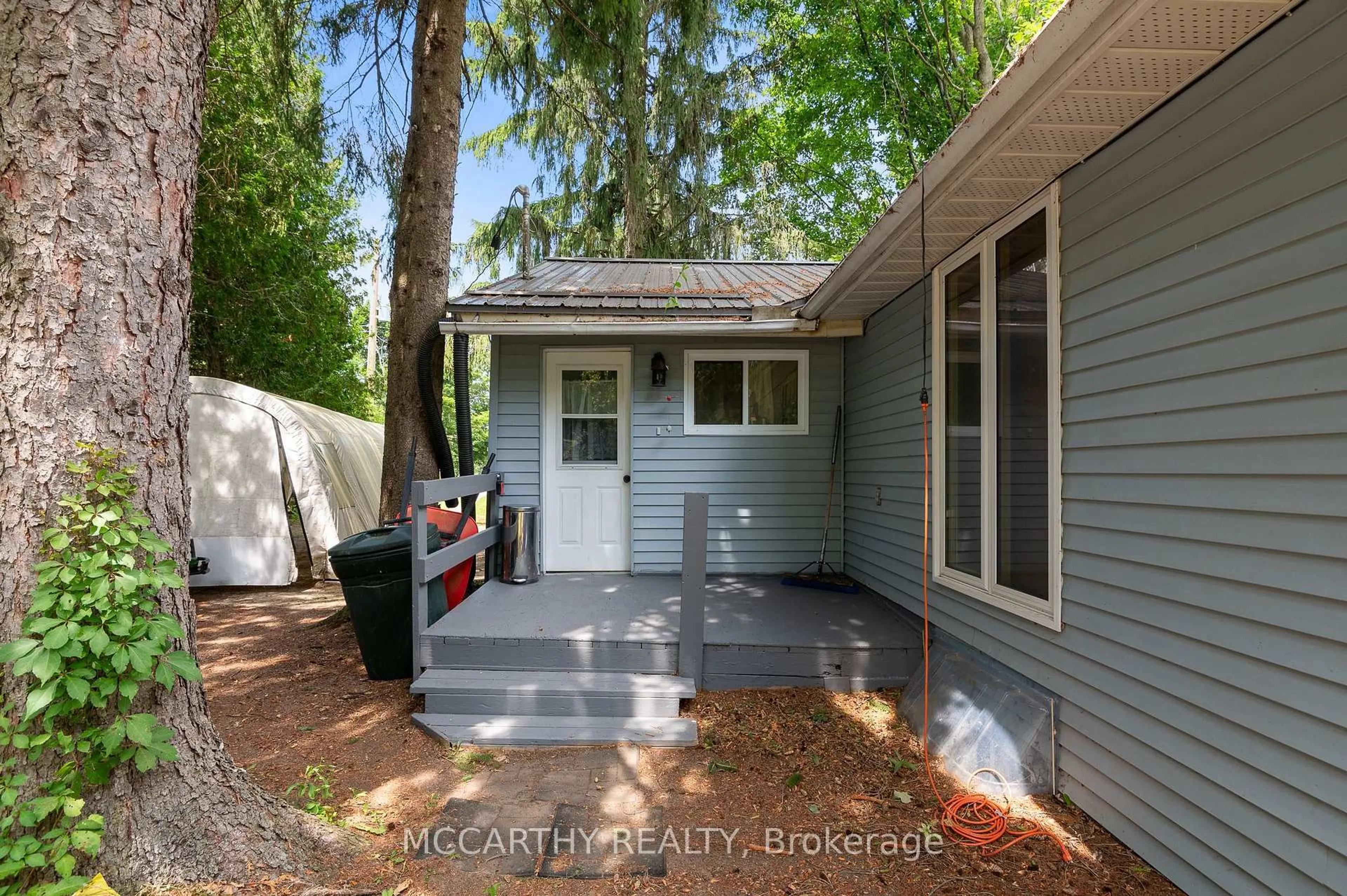 Home with vinyl exterior material, street for 21 McCutcheon Rd, Mulmur Ontario L9V 3E8