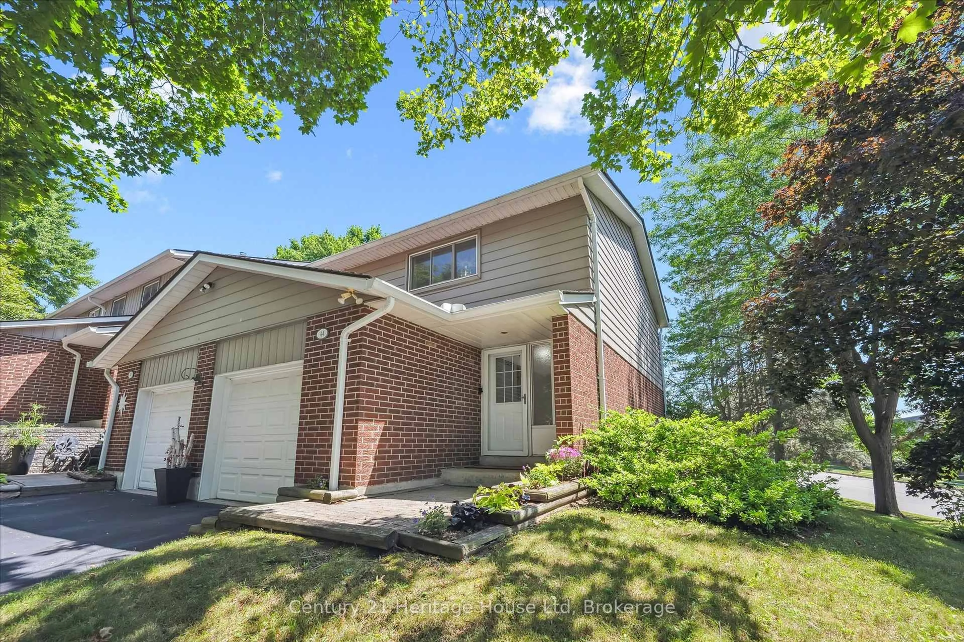Home with brick exterior material, street for 16 Hadati Rd #44, Guelph Ontario N1E 6M2