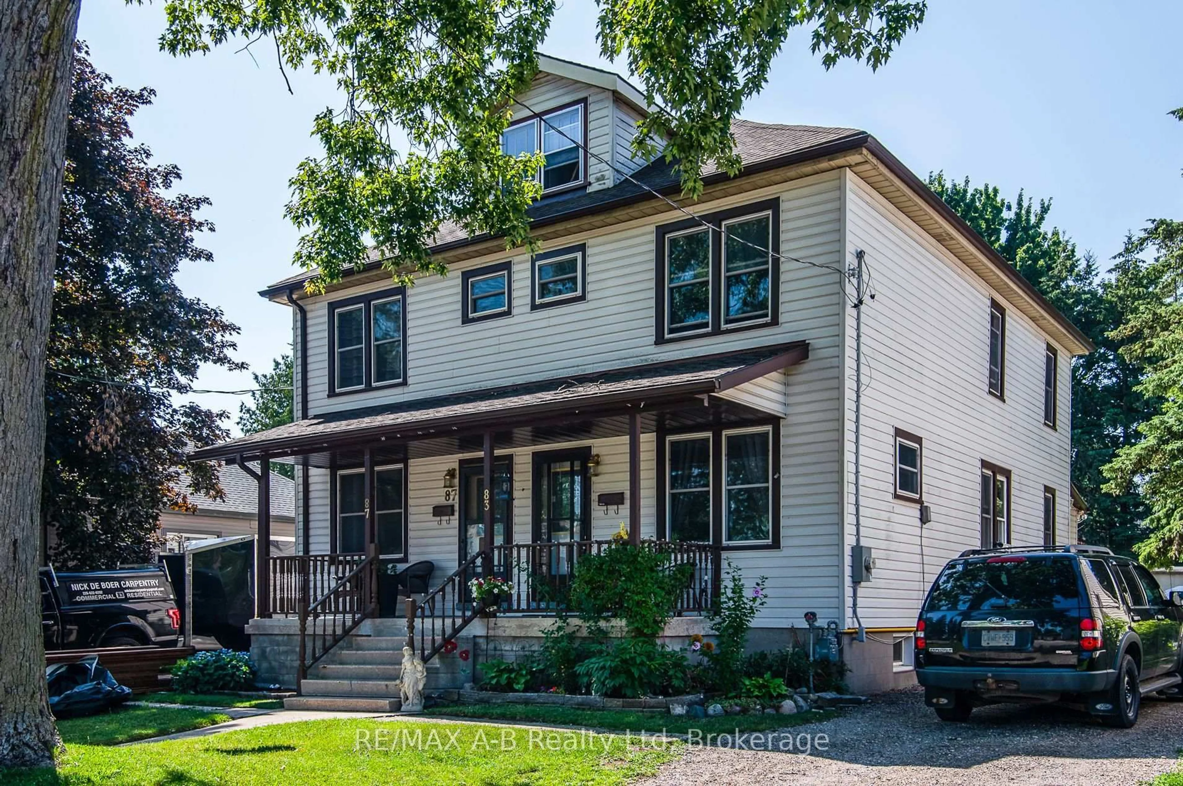 Home with vinyl exterior material, street for 83 East Gore St, Stratford Ontario N5A 3X4