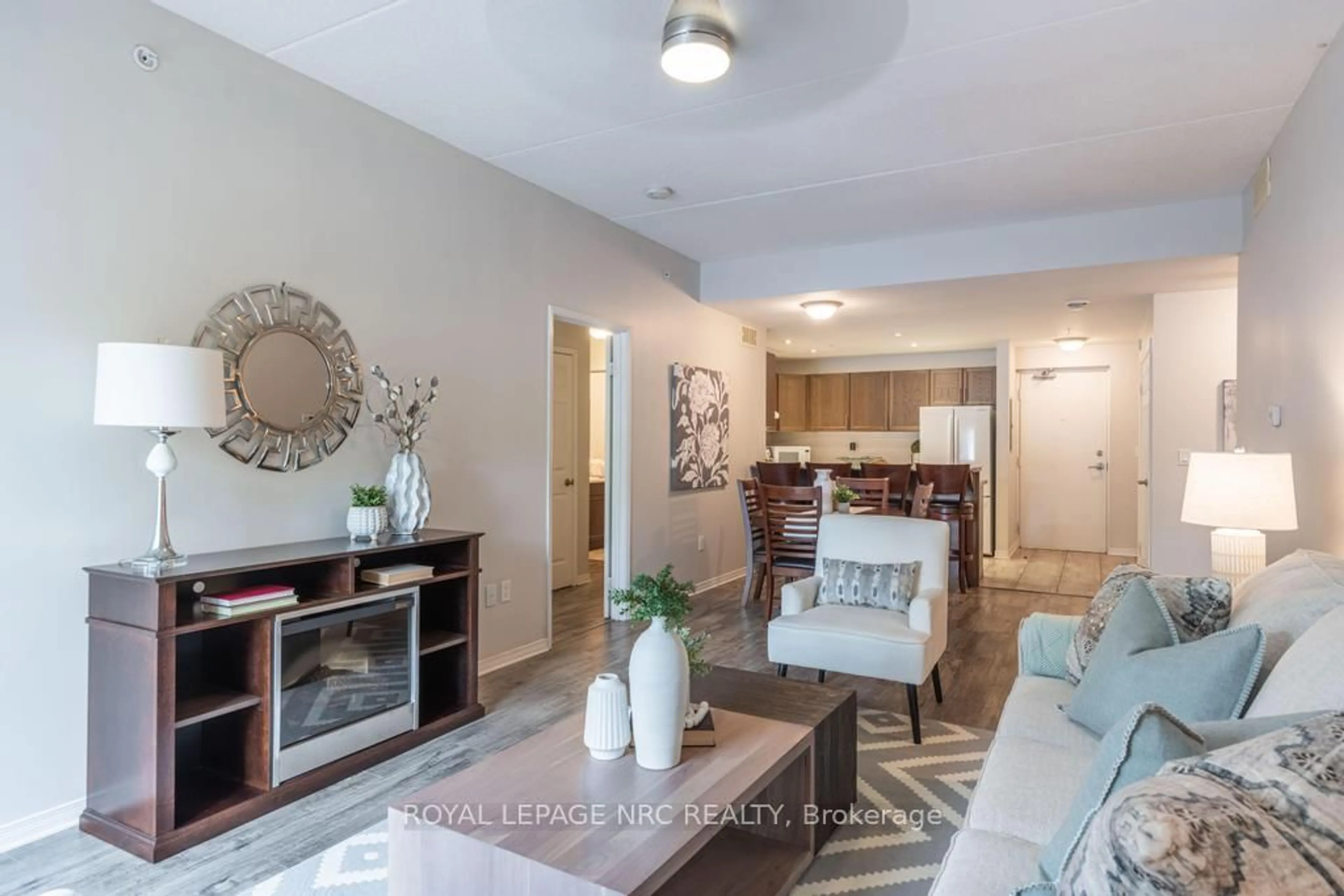 Living room with furniture, unknown for 16 Sullivan Ave #101, Thorold Ontario L2V 2Y2