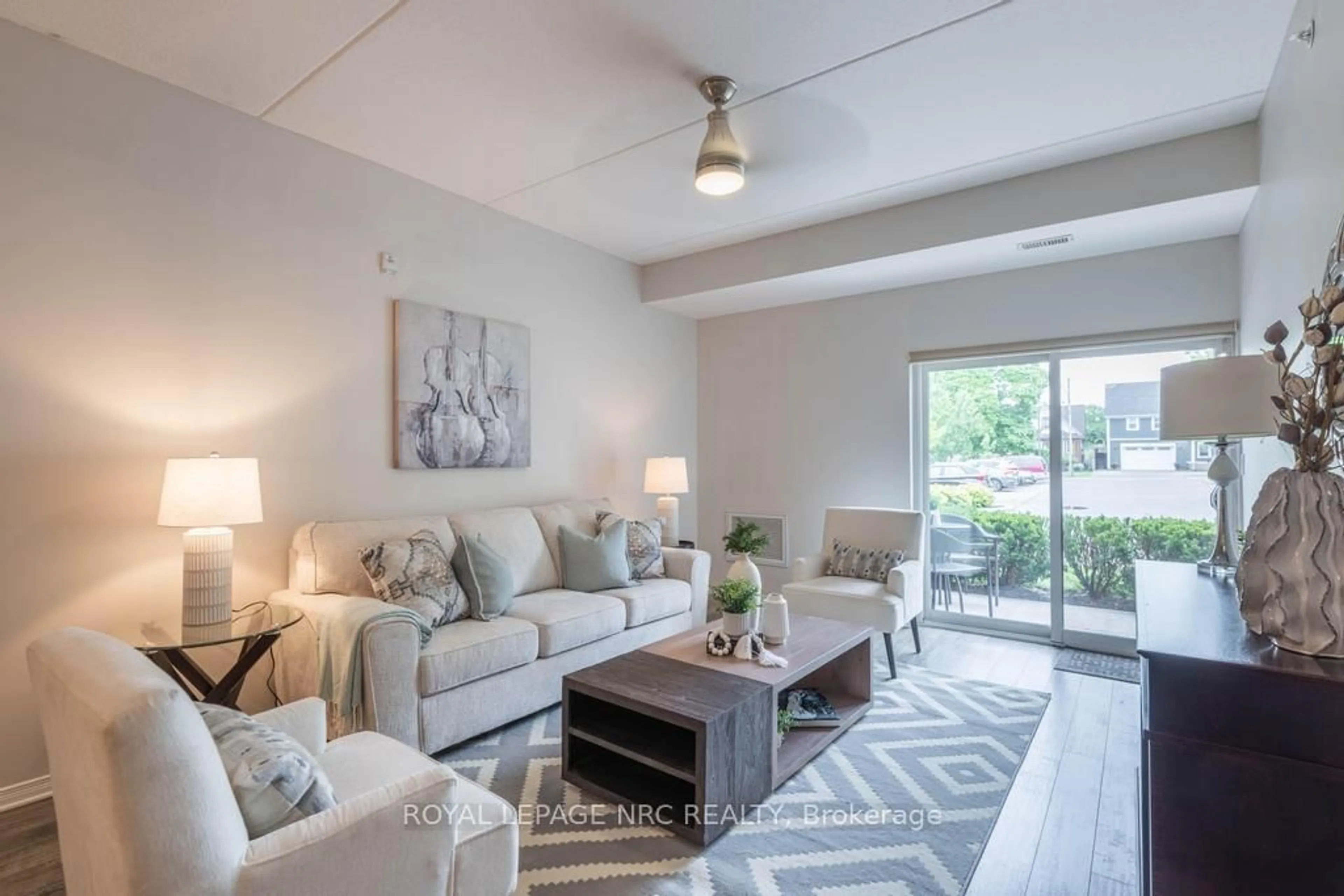 Living room with furniture, unknown for 16 Sullivan Ave #101, Thorold Ontario L2V 2Y2
