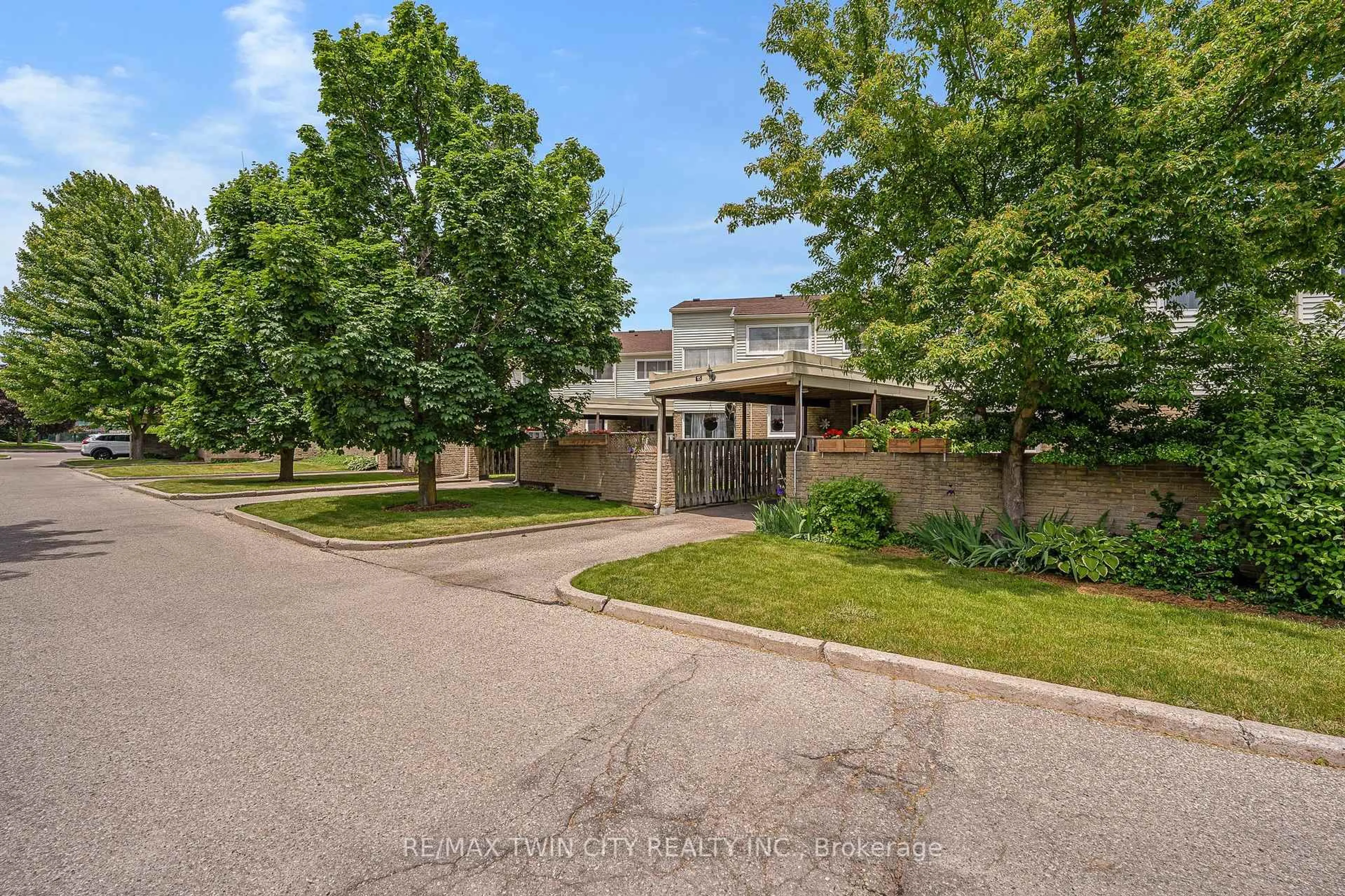 A pic from outside/outdoor area/front of a property/back of a property/a pic from drone, street for 415 Morgan Ave #15, Kitchener Ontario N2A 2V6