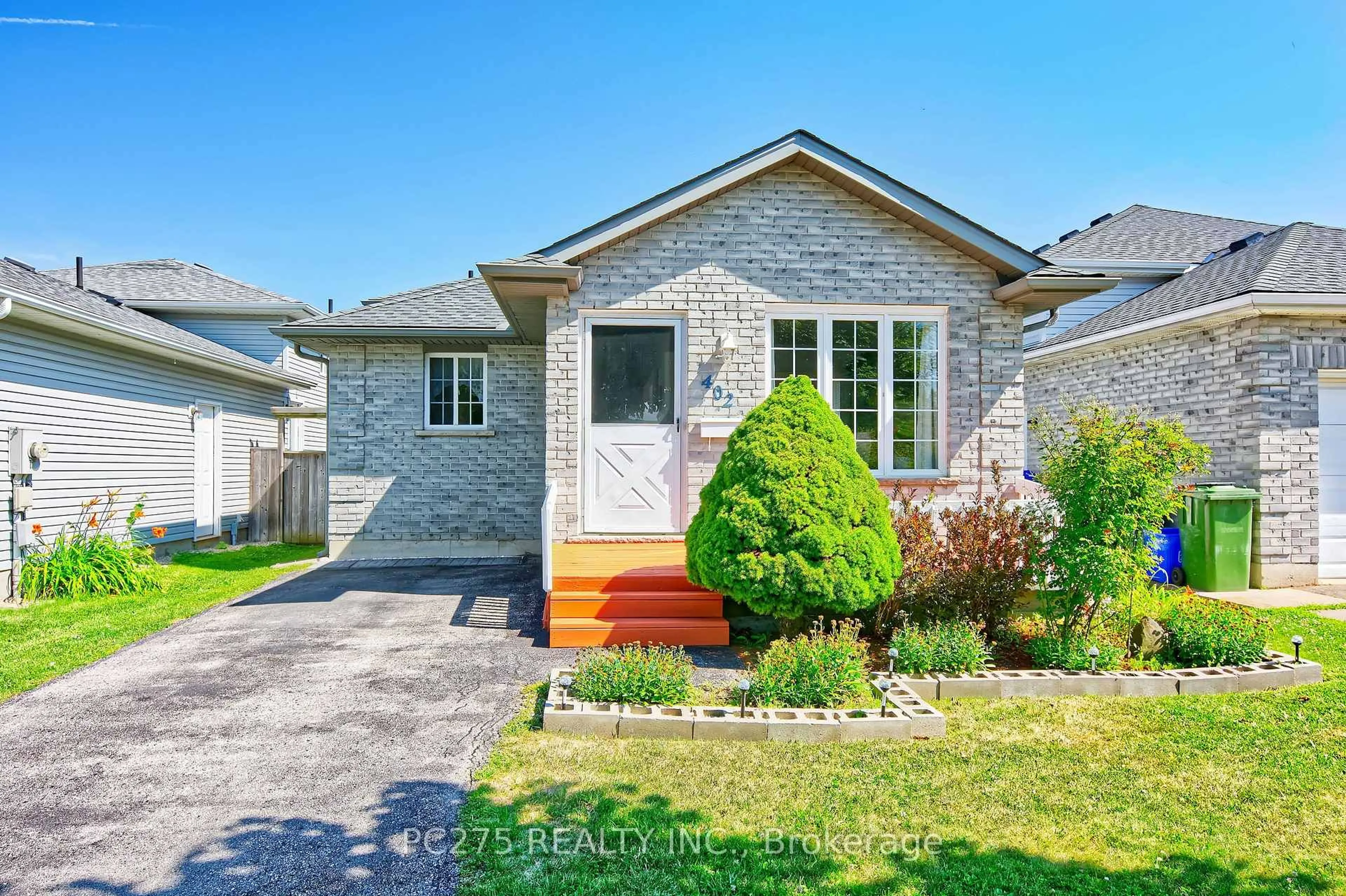 Home with brick exterior material, street for 402 Chestnut St, St. Thomas Ontario N5R 6E9