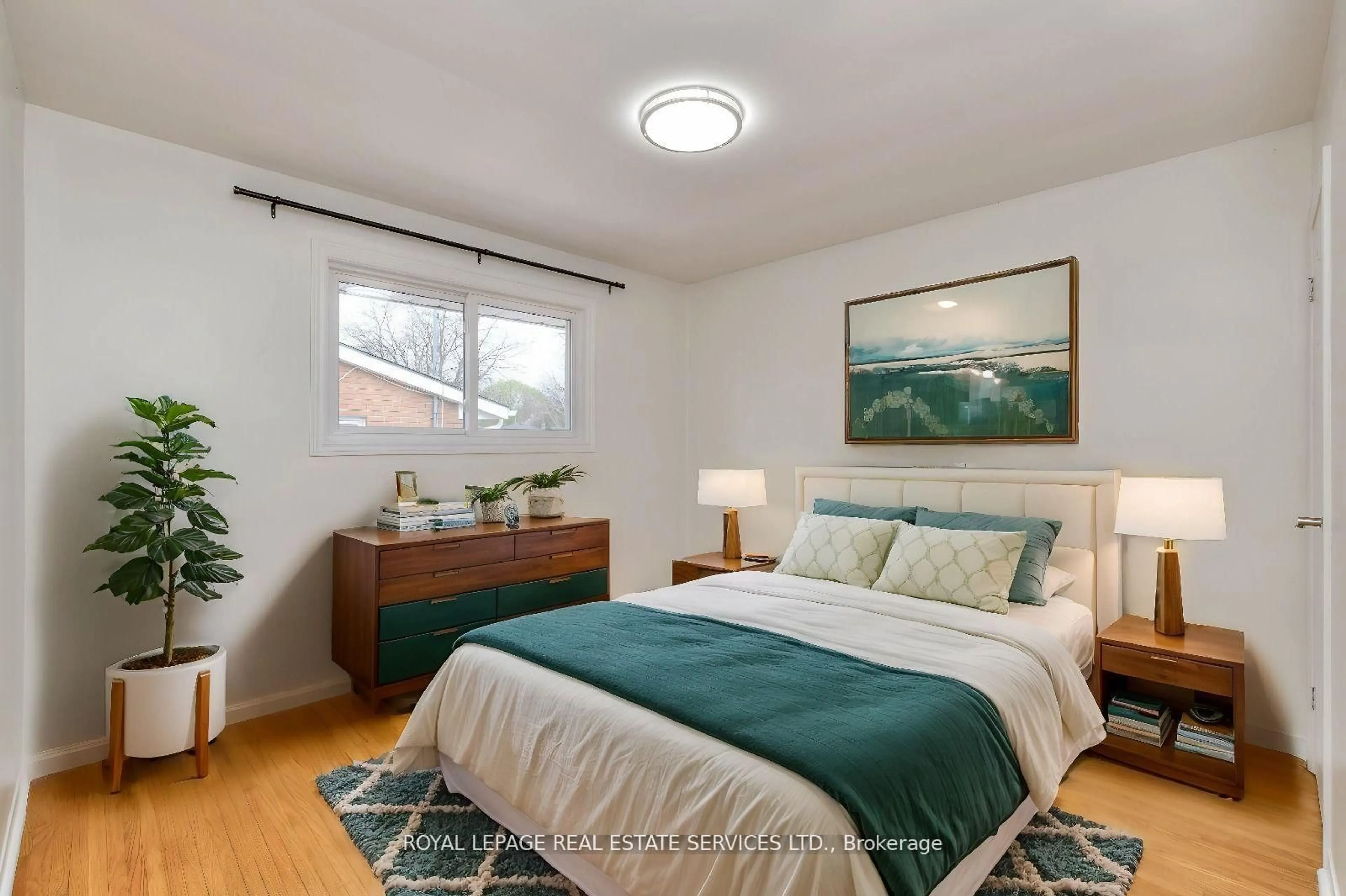 Bedroom with bed, wood/laminate floor for 484 Speedvale Ave, Guelph Ontario N1E 1P2