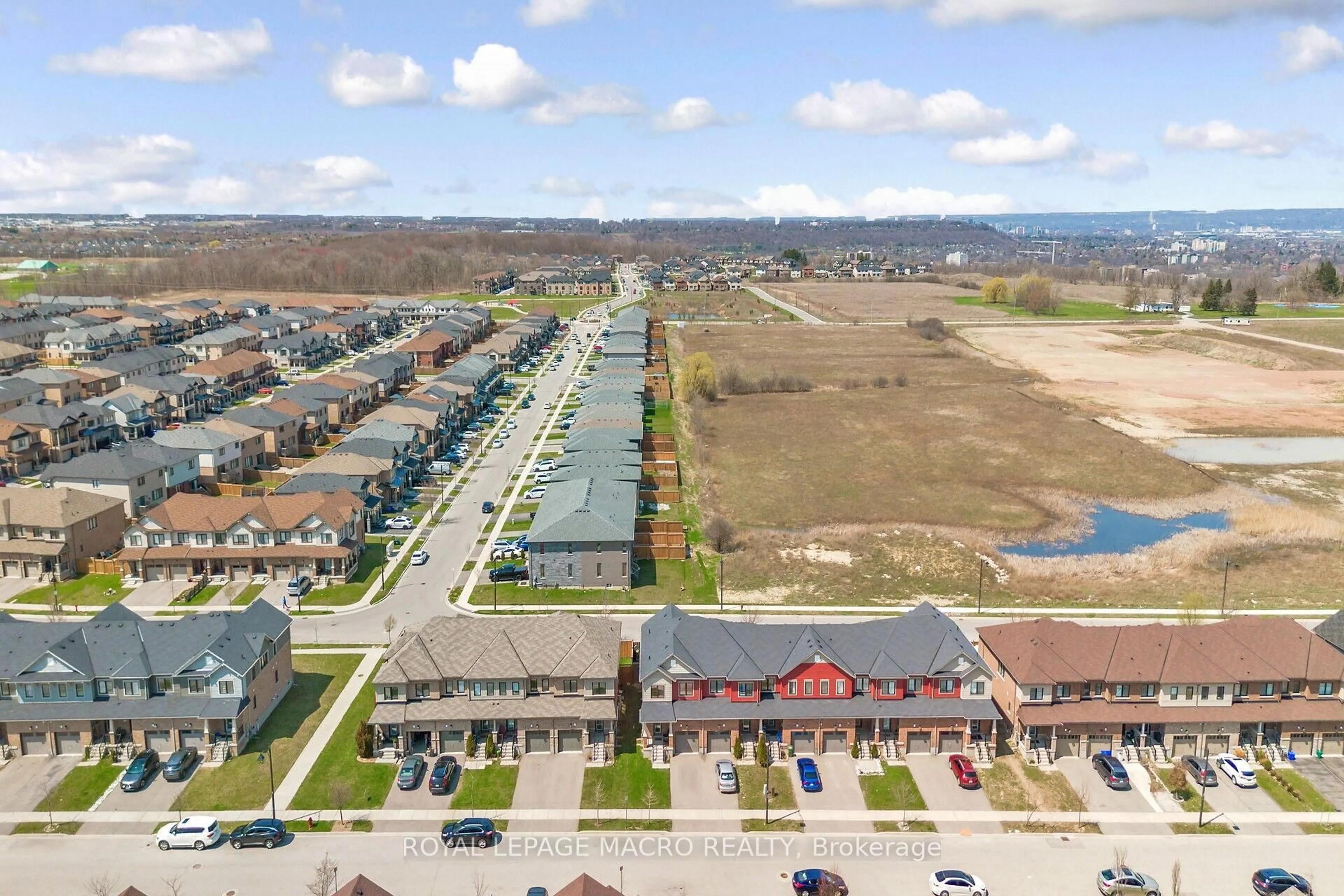 A pic from outside/outdoor area/front of a property/back of a property/a pic from drone, water/lake/river/ocean view for 43 Sherway St, Hamilton Ontario L8J 0J3