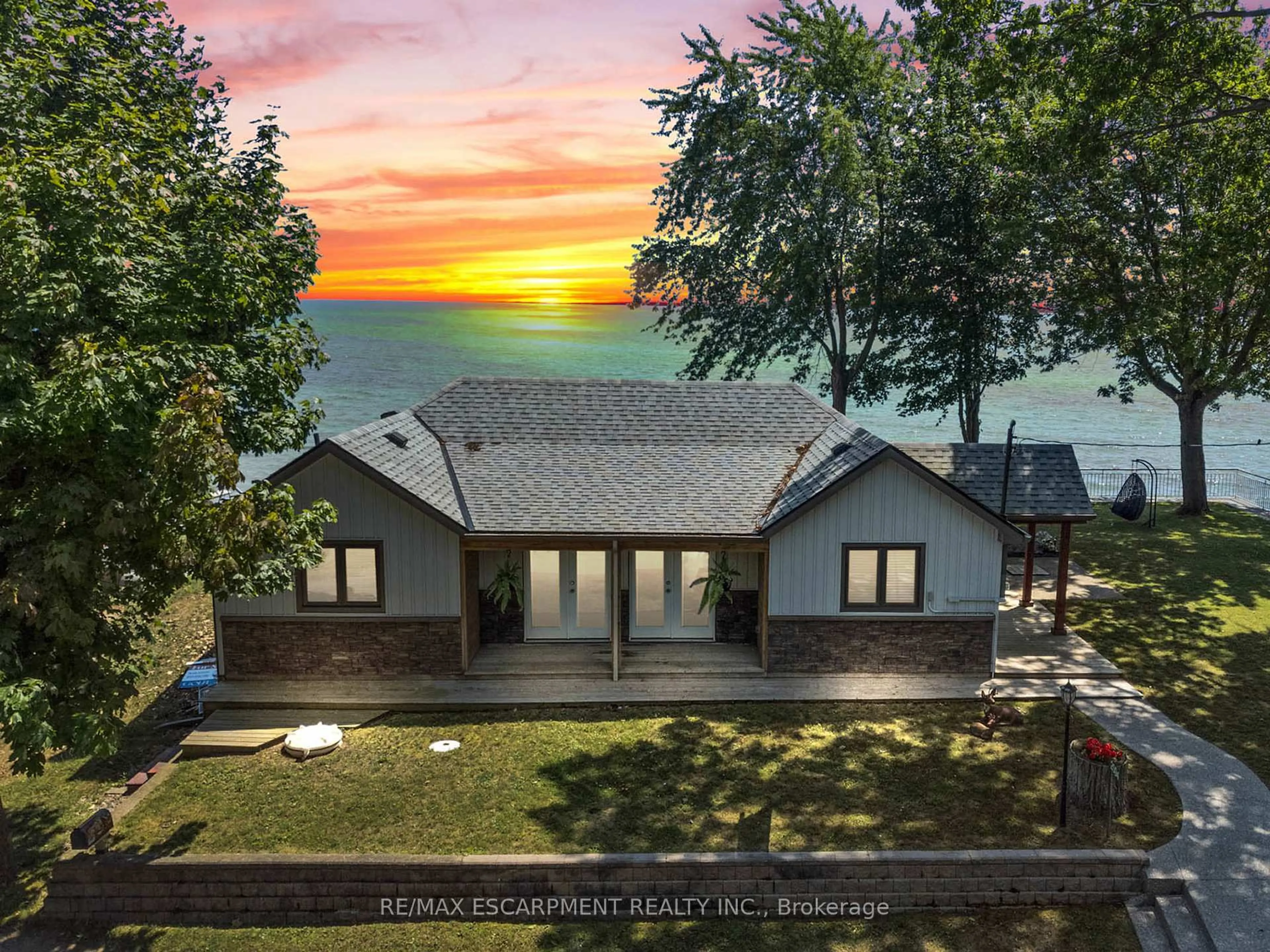 A pic from outside/outdoor area/front of a property/back of a property/a pic from drone, water/lake/river/ocean view for 2094 Lakeshore Rd, Haldimand Ontario N1A 2W8